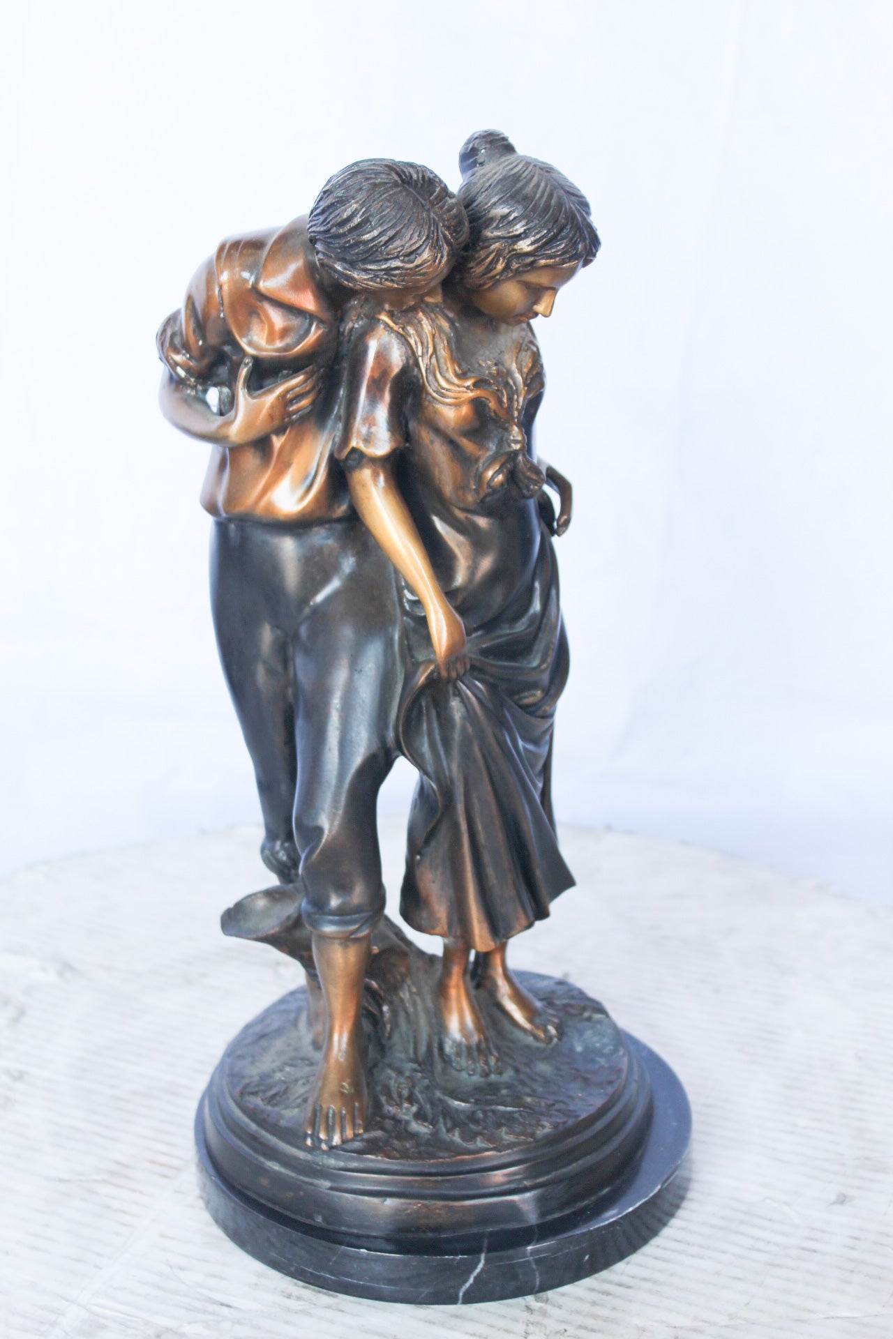 Two shy lovers bronze statue - Size: 8"L x 8"W x 15"H.