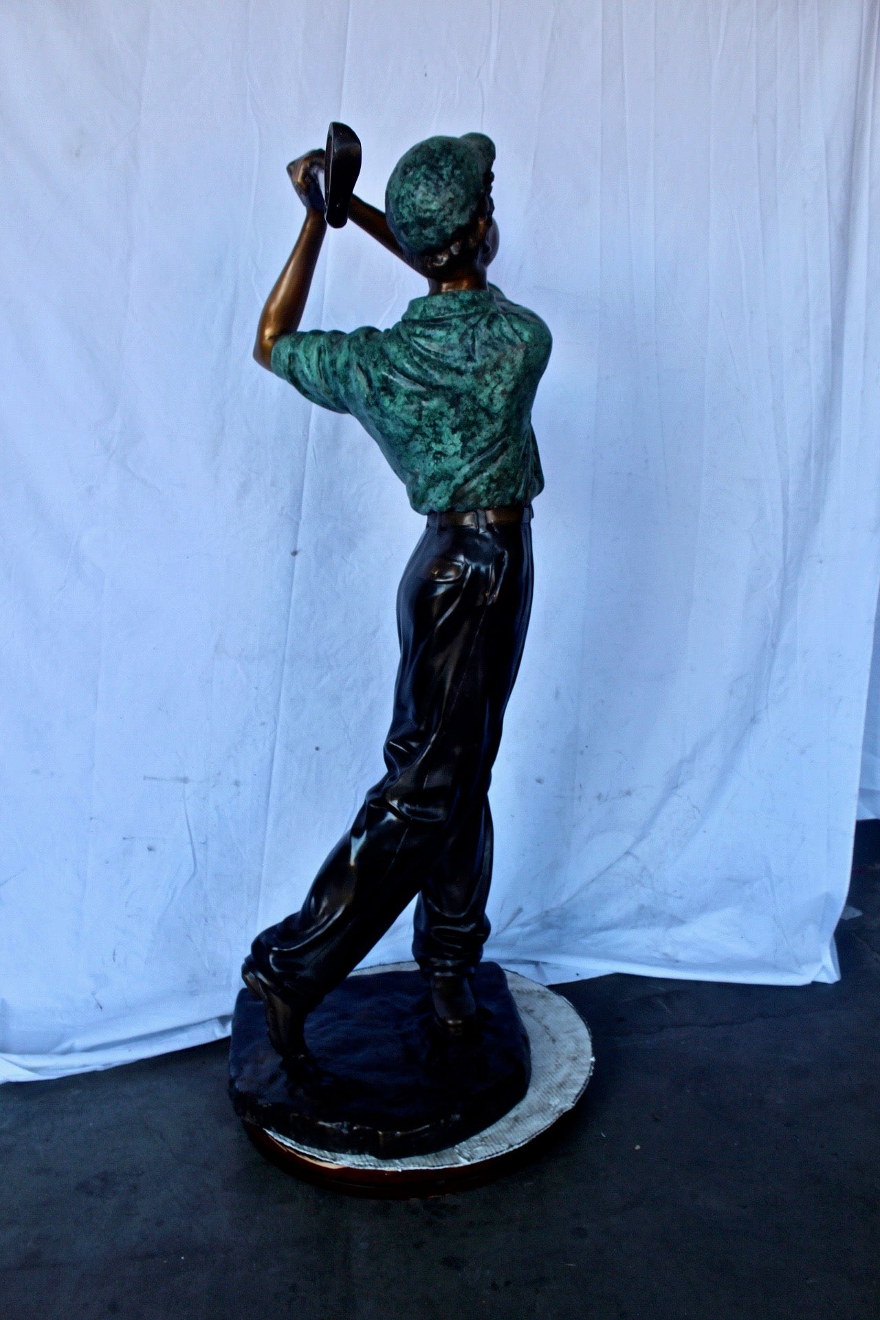 Confident golfer bronze statue -  Size: 23"L x 21"W x 58"H.
