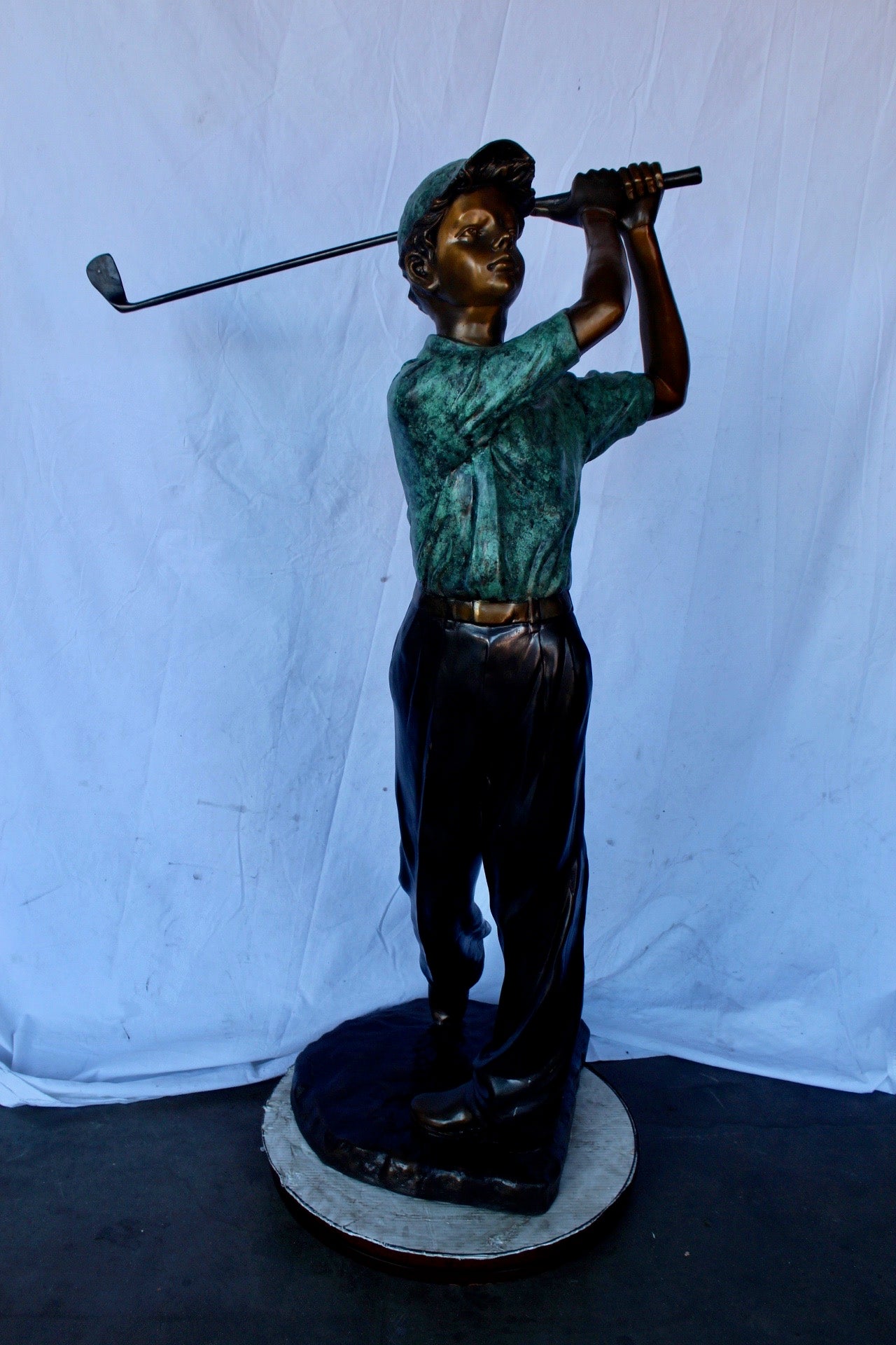 Confident golfer bronze statue -  Size: 23"L x 21"W x 58"H.