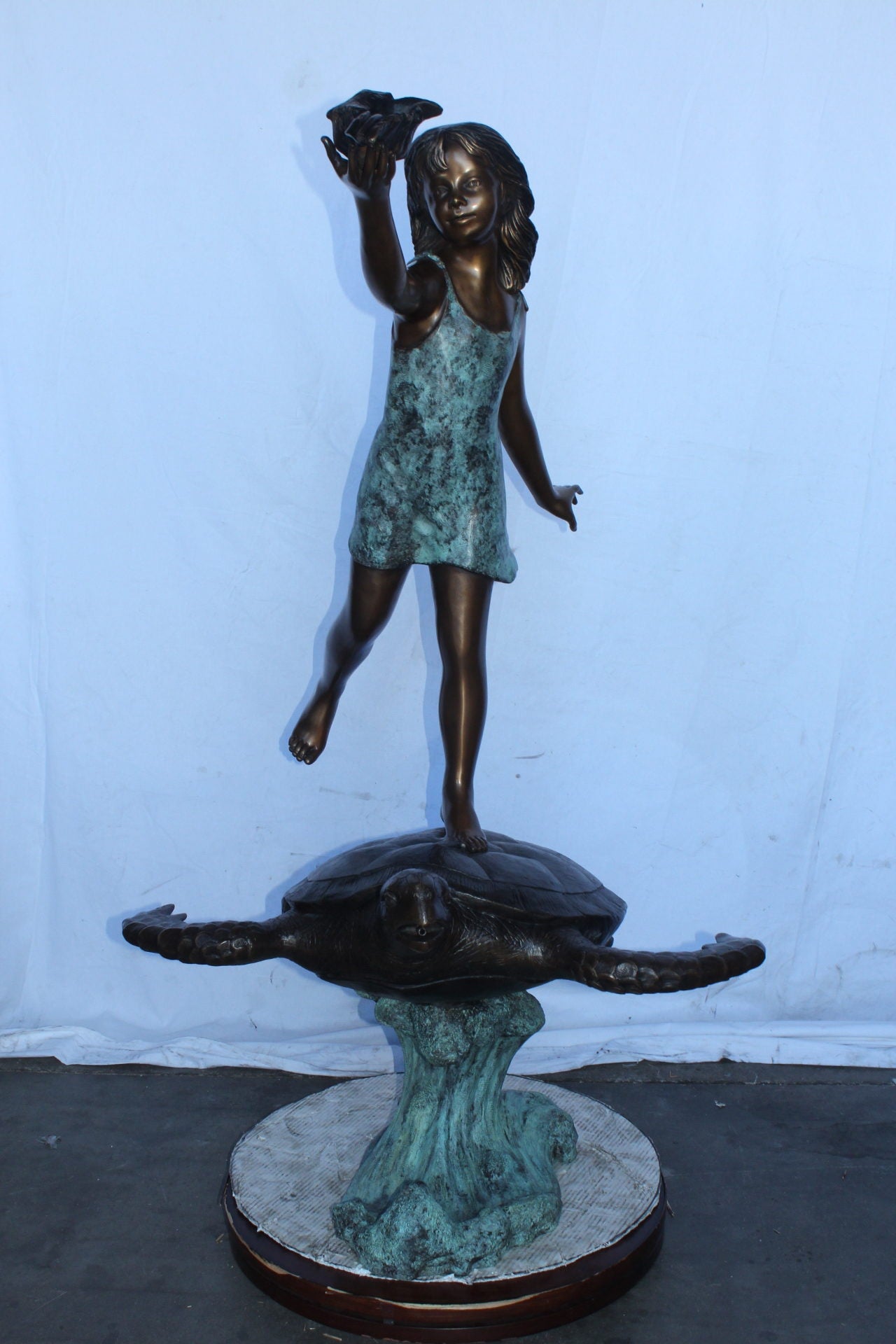 Adventurous girl on a turtle bronze statue fountain -  Size: 35" x 29" x 56"H.