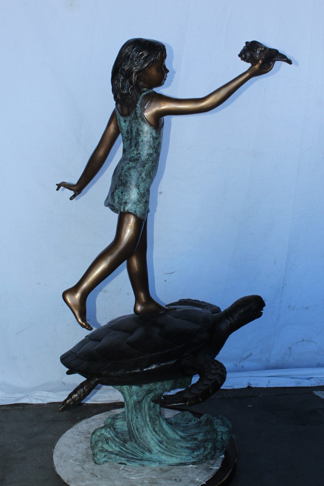 Adventurous girl on a turtle bronze statue fountain - Size: 35" x 29" x 56"H.