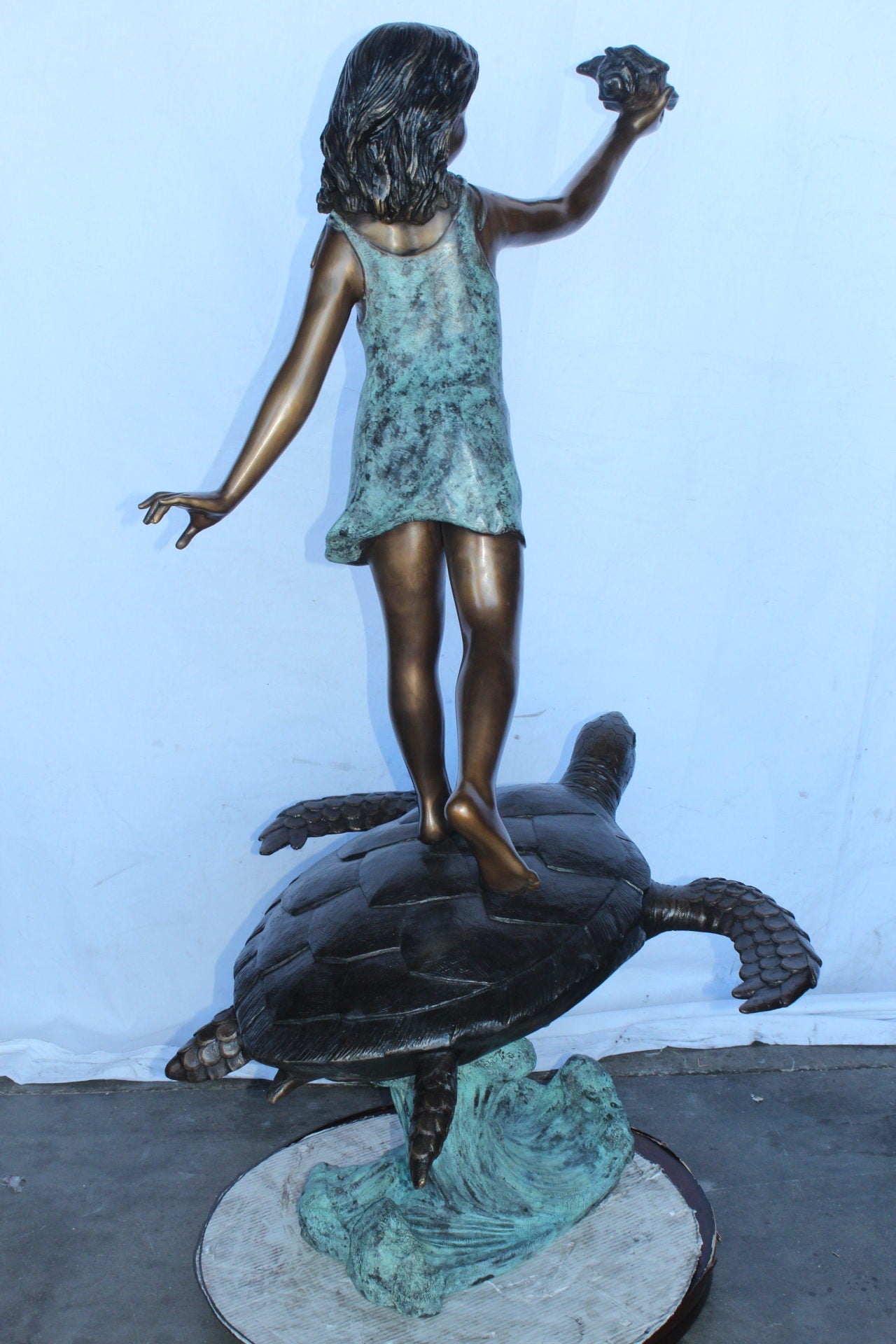 Adventurous girl on a turtle bronze statue fountain -  Size: 35" x 29" x 56"H.