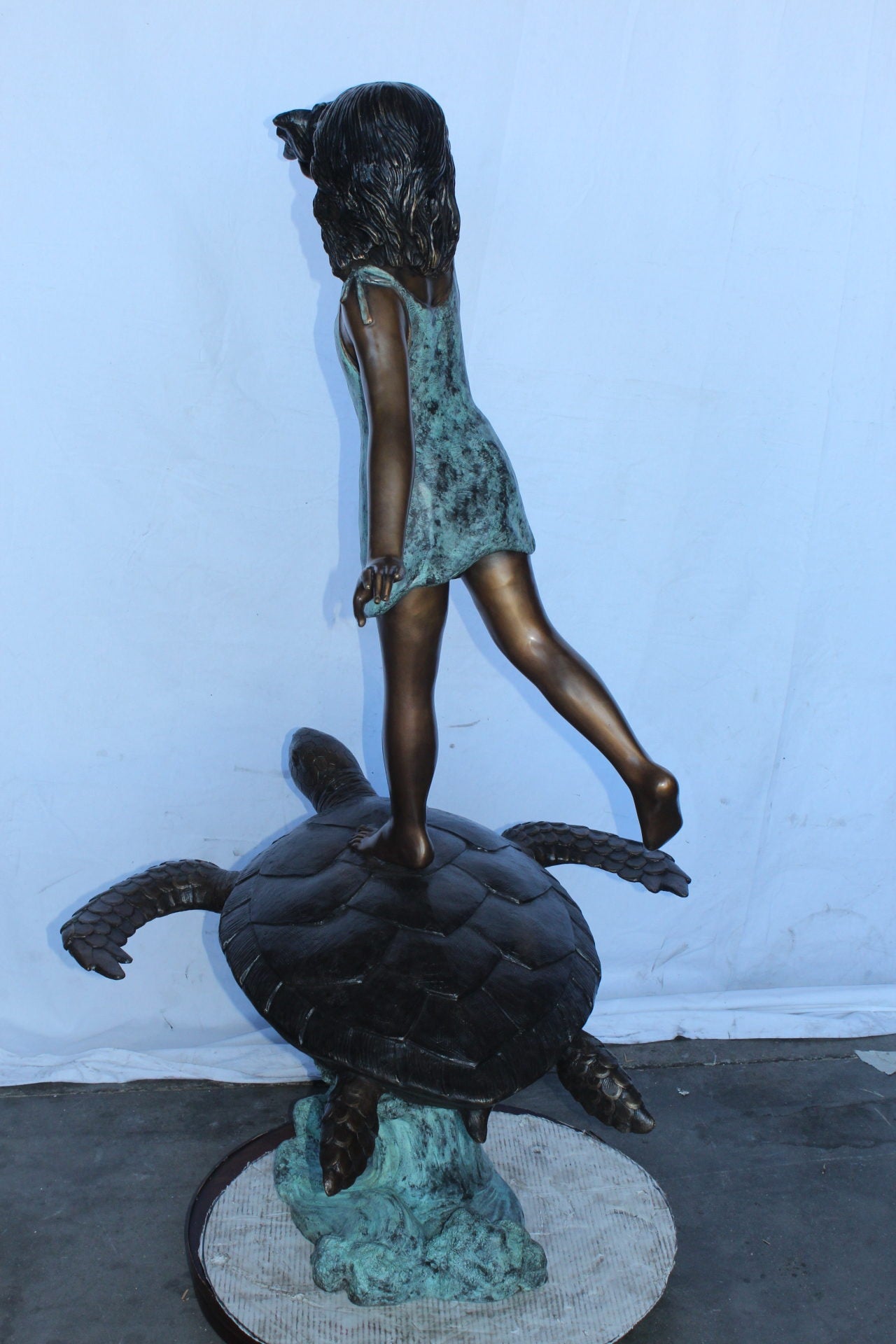 Adventurous girl on a turtle bronze statue fountain -  Size: 35" x 29" x 56"H.