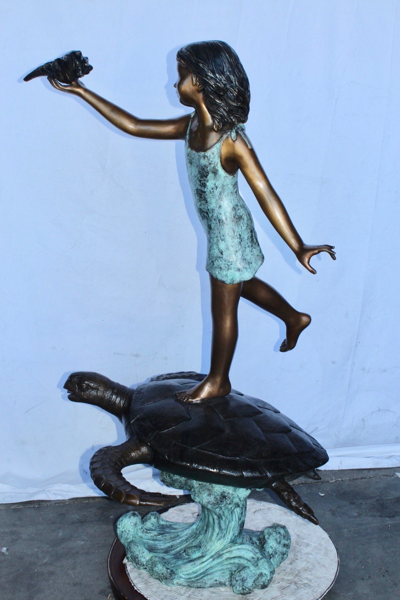 Adventurous girl on a turtle bronze statue fountain -  Size: 35" x 29" x 56"H.