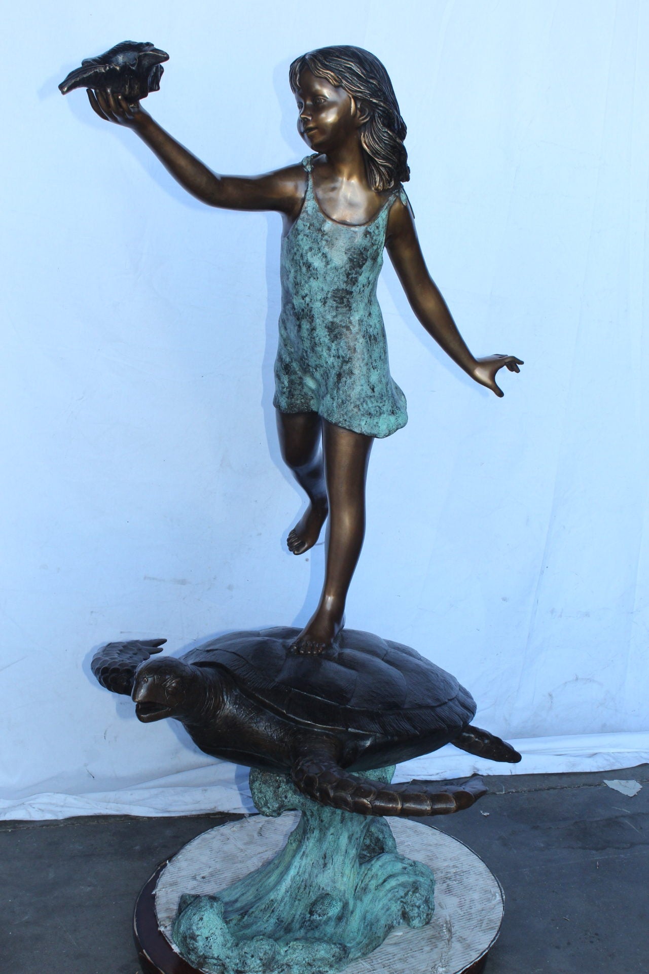 Adventurous girl on a turtle bronze statue fountain -  Size: 35" x 29" x 56"H.