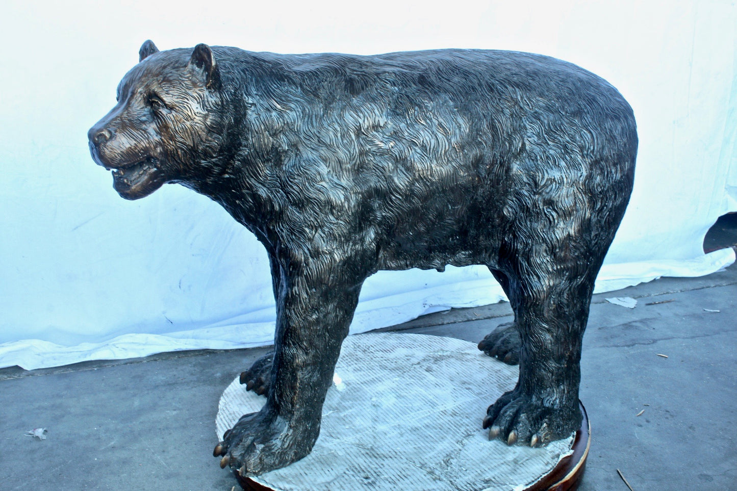 Bear standing on four legs bronze statue  -  Size: 36"L x 16"W x 24"H.