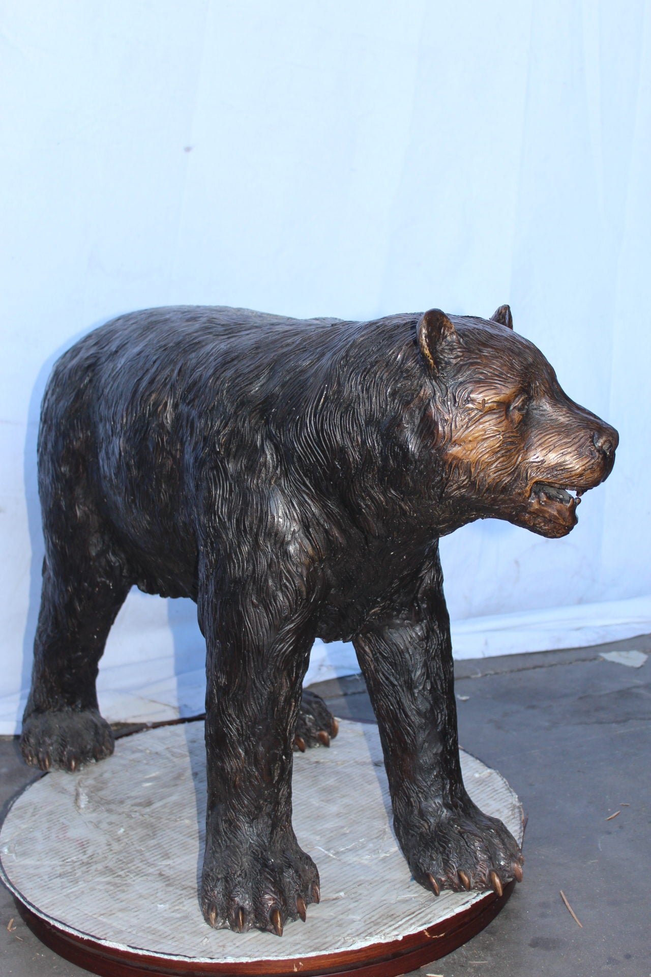 Bear standing on four legs bronze statue  -  Size: 36"L x 16"W x 24"H.