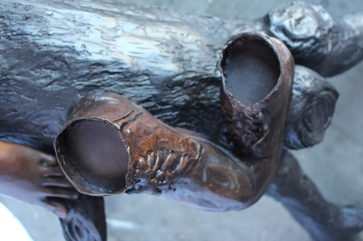 Boy and girl reading on arched tree bronze statue - Size: 70"L x 29"W x 56"H