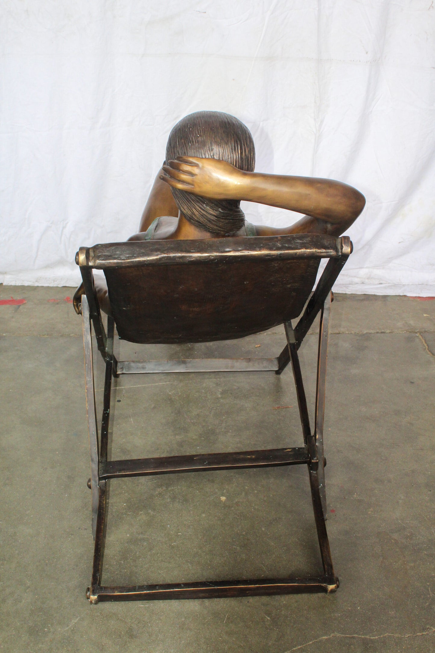 Life Size Bronze Statue of a Lady Sitting on a Beach Chair 64" x 25" x 38"H