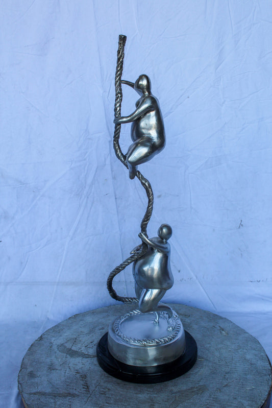 Two Voluptuous Women Climbing a Rope Statue, Silver Finish 10" x 10" x 29"H