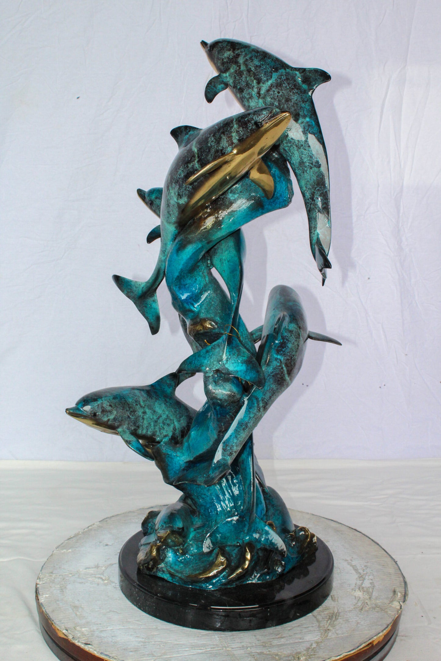 Nifao Bronze Dolphin Pod Sculpture – Spiral Formation of Dolphins with Blue-Green Patina & Polished Bronze Accents – Handcrafted Lost Wax Cast Marine Life Statue on Base 14" x 16" x 35"H