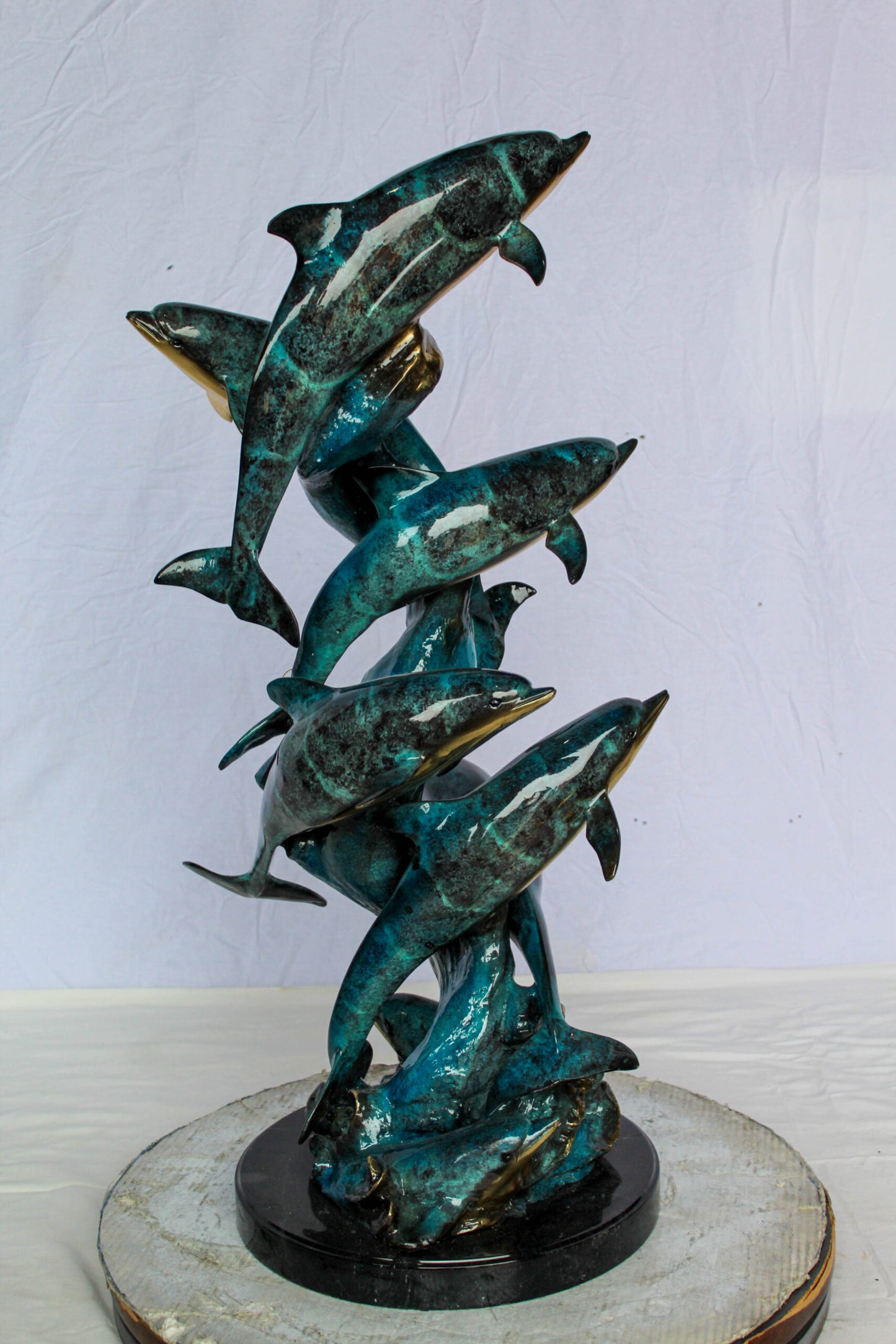 Nifao Bronze Dolphin Pod Sculpture – Spiral Formation of Dolphins with Blue-Green Patina & Polished Bronze Accents – Handcrafted Lost Wax Cast Marine Life Statue on Base 14" x 16" x 35"H