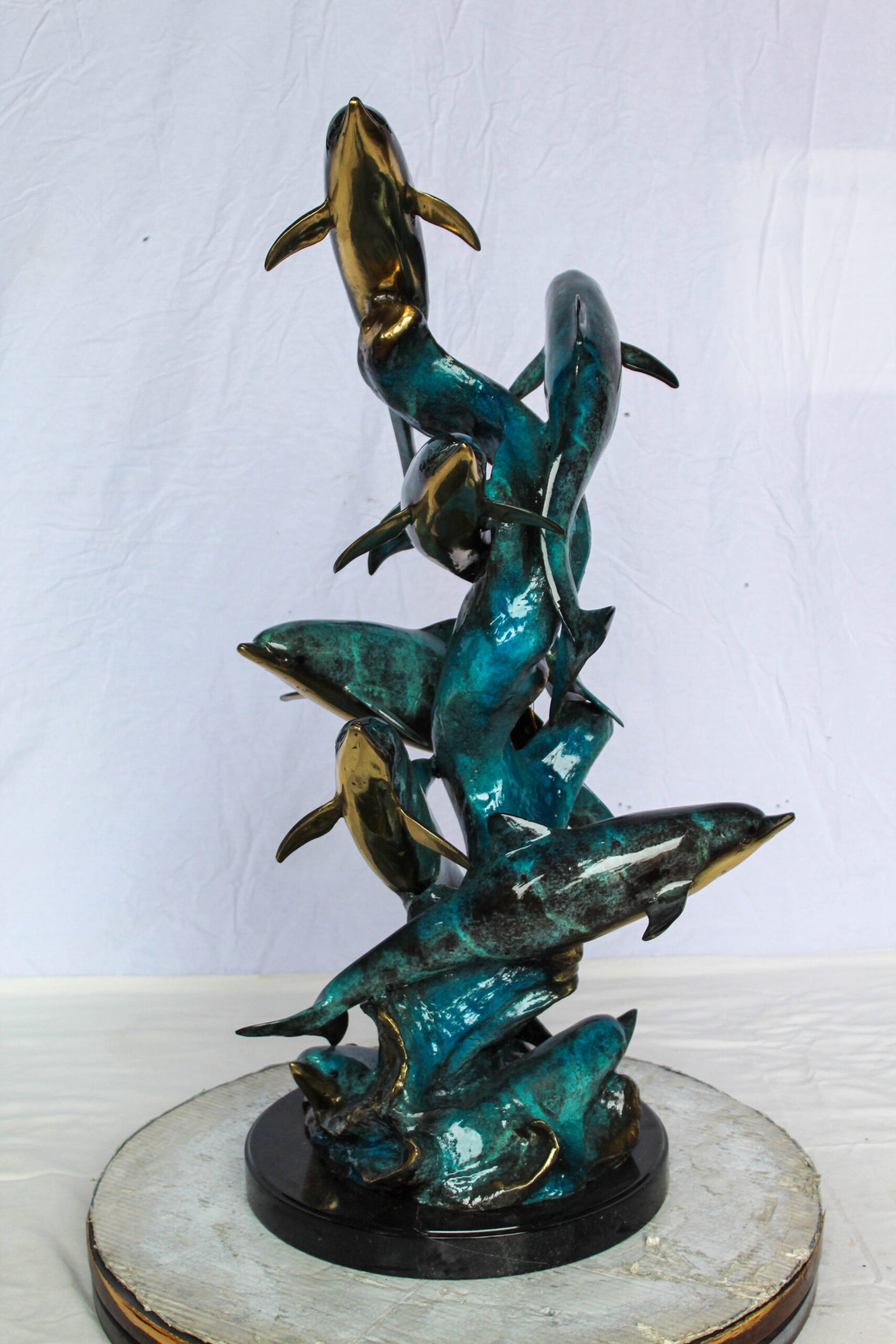 Nifao Bronze Dolphin Pod Sculpture – Spiral Formation of Dolphins with Blue-Green Patina & Polished Bronze Accents – Handcrafted Lost Wax Cast Marine Life Statue on Base 14" x 16" x 35"H