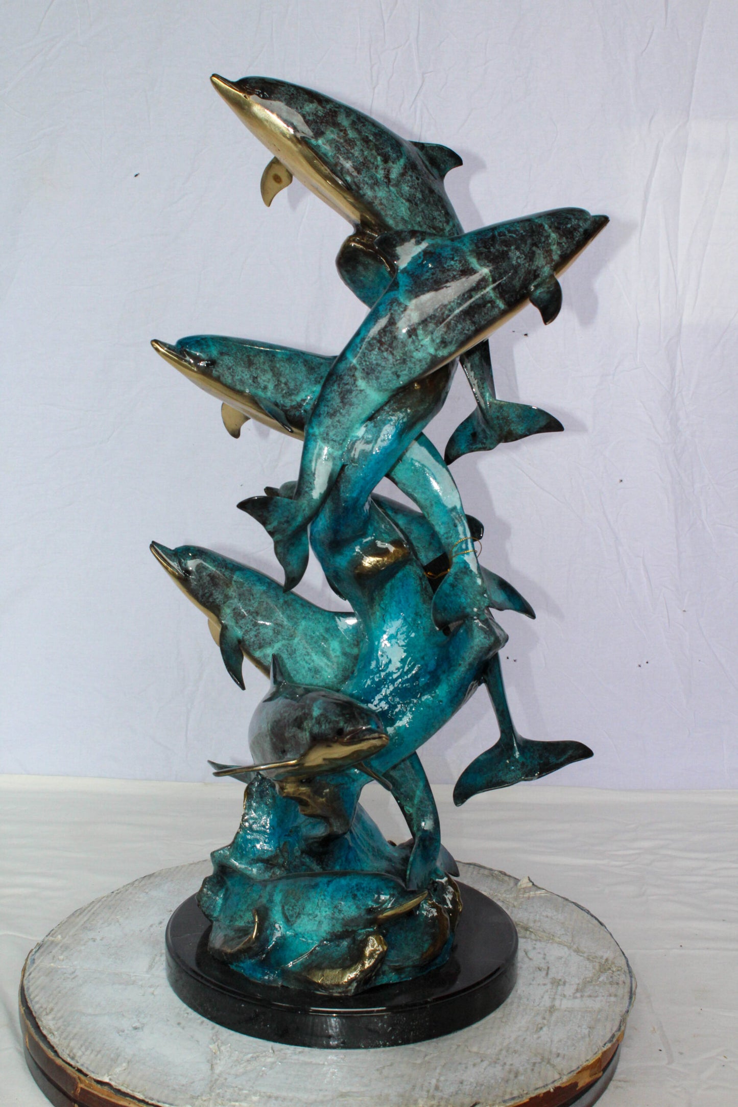 Nifao Bronze Dolphin Pod Sculpture – Spiral Formation of Dolphins with Blue-Green Patina & Polished Bronze Accents – Handcrafted Lost Wax Cast Marine Life Statue on Base 14" x 16" x 35"H
