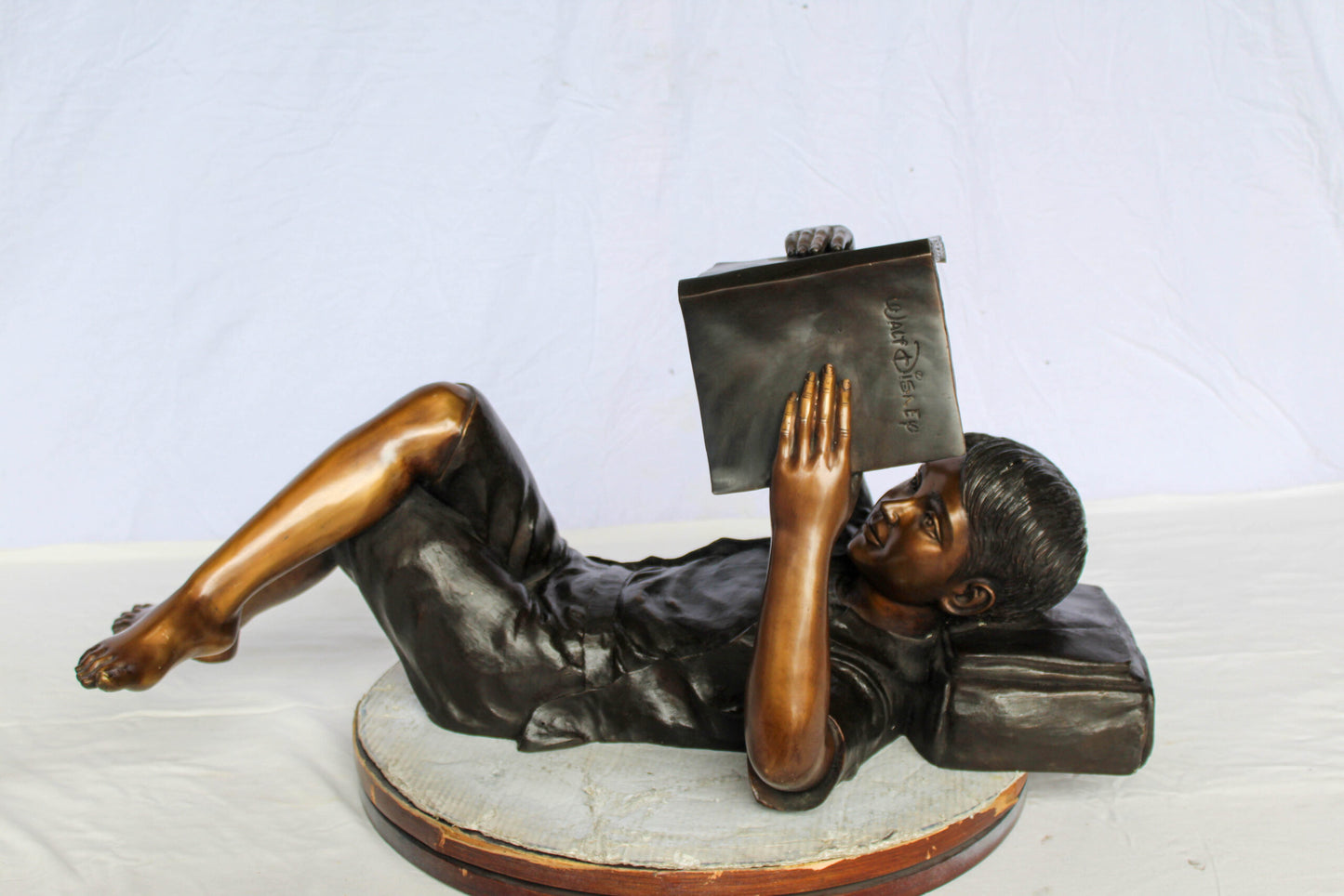 Nifao Bronze Boy Reading Statue – Large Handcrafted Lost Wax Sculpture of Young Boy Lying Back with Book – Detailed Child Figurine for Study, Library, Garden, or Home Déco 41" x 22" x 18"H