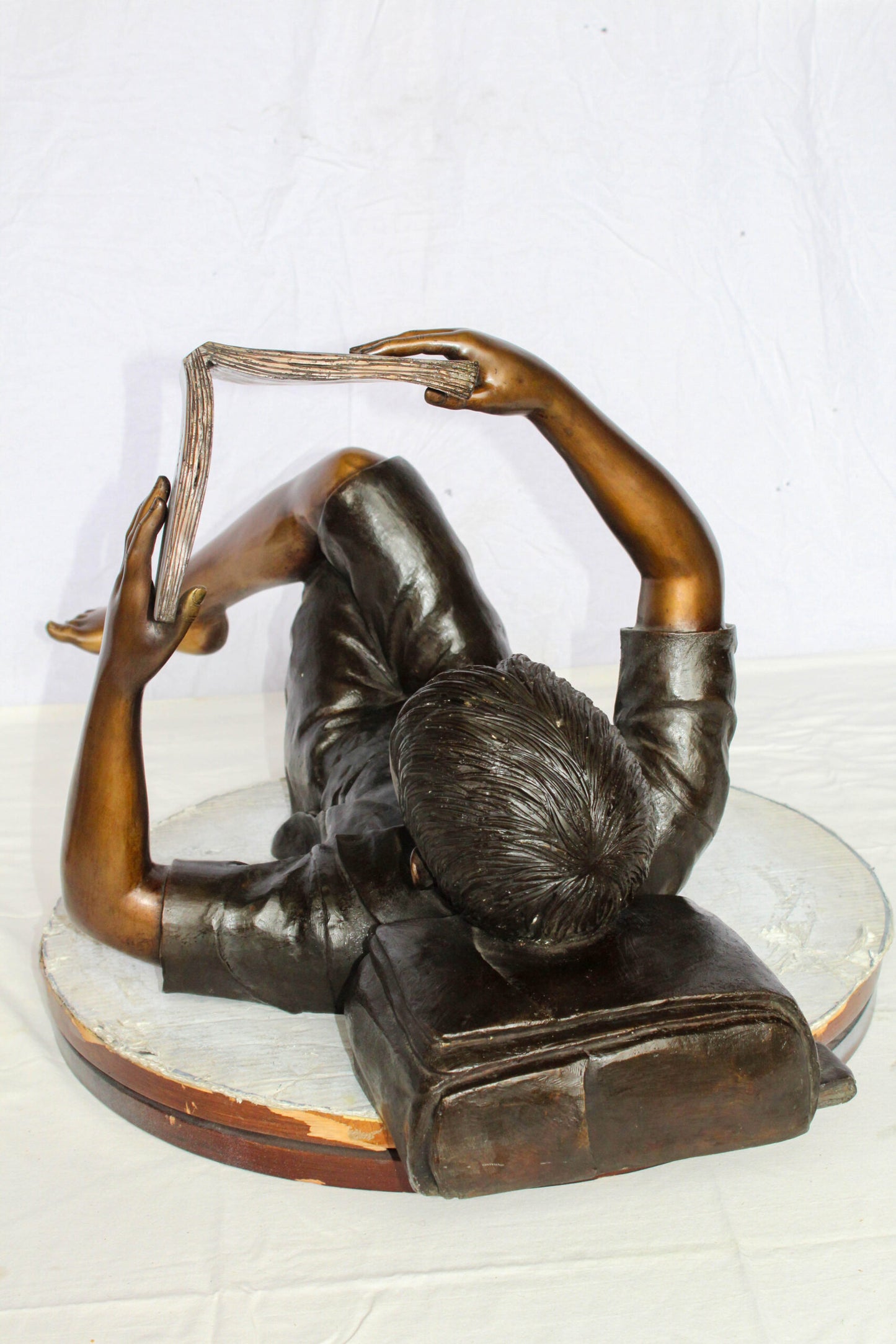 Nifao Bronze Boy Reading Statue – Large Handcrafted Lost Wax Sculpture of Young Boy Lying Back with Book – Detailed Child Figurine for Study, Library, Garden, or Home Déco 41" x 22" x 18"H
