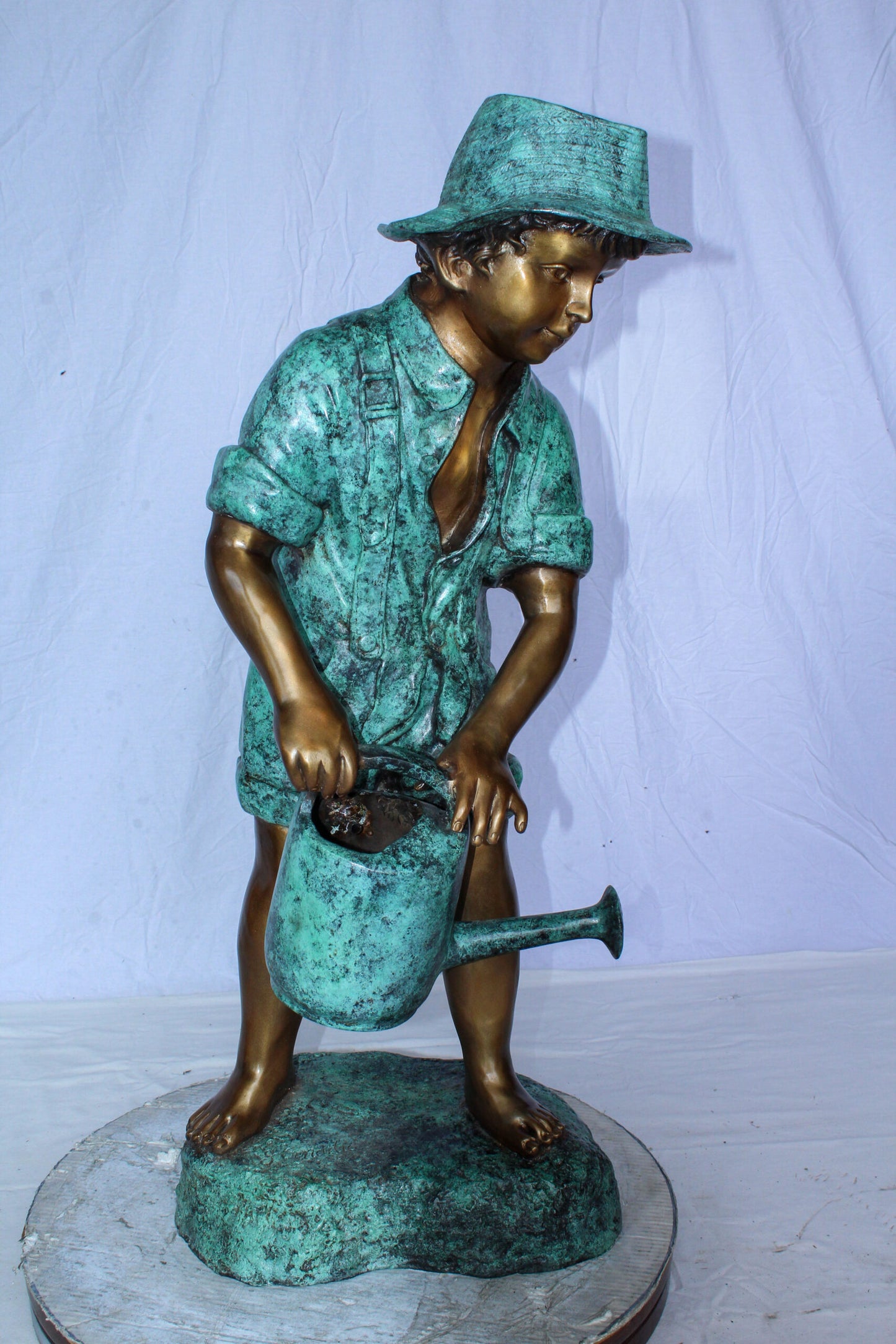 Standing Boy with Watering Can Bronze Statue - Size: 15"L x 15"W x 39"H.