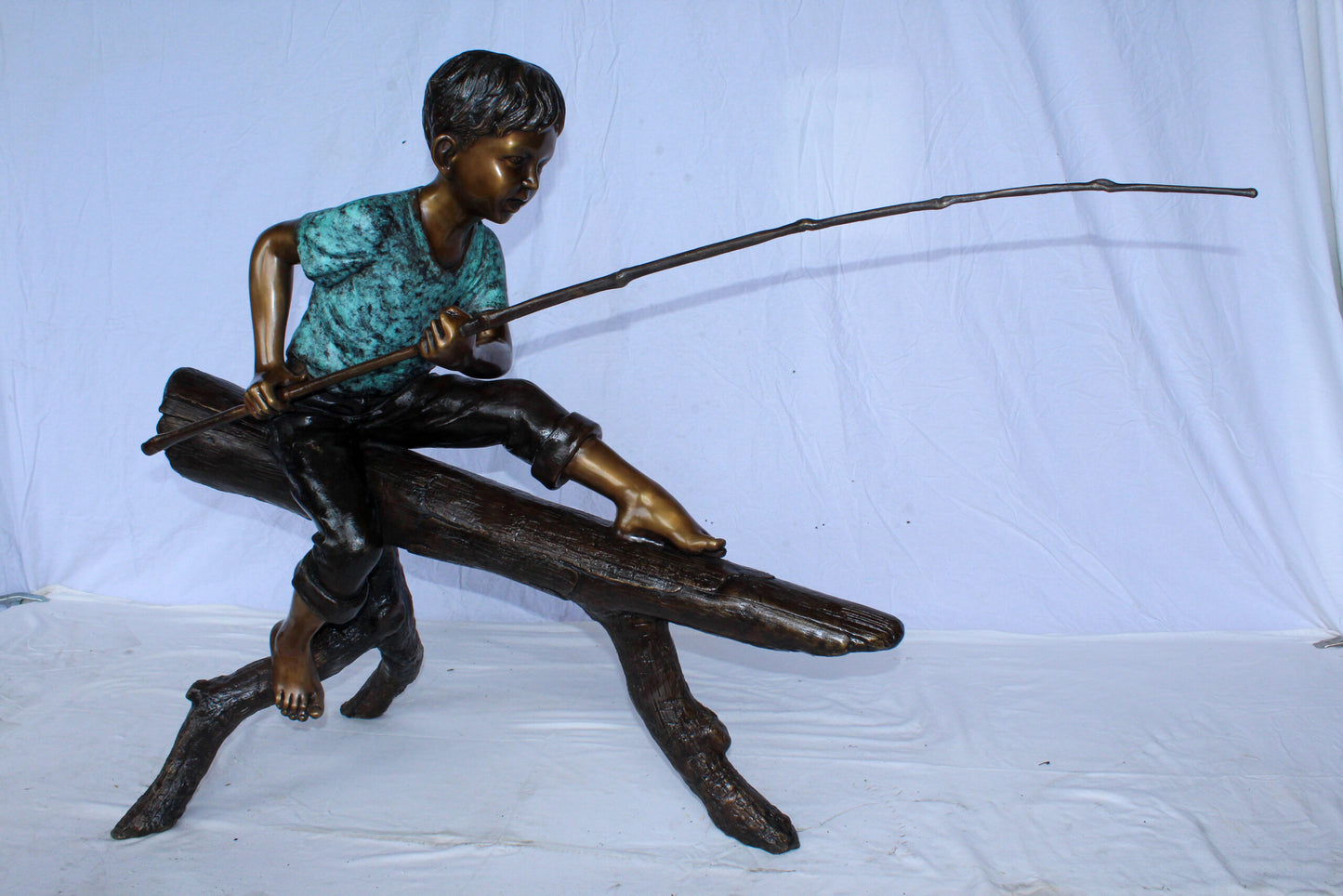 Bronze Statue of Boy Fishing Sitting on Tree Log 50" x 19" x 35"H