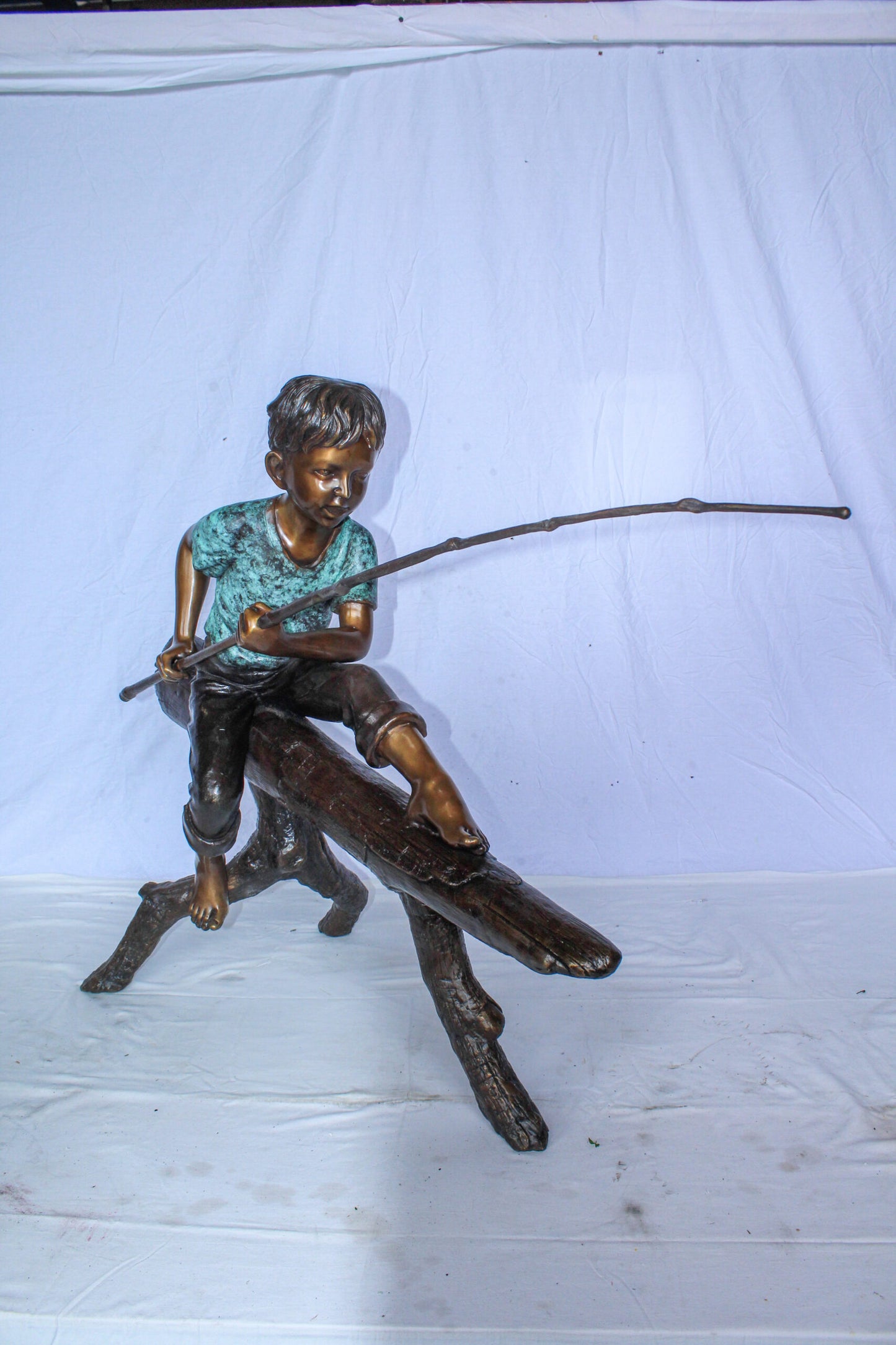 Bronze Statue of Boy Fishing Sitting on Tree Log 50" x 19" x 35"H