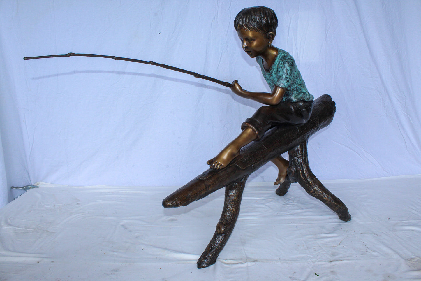 Bronze Statue of Boy Fishing Sitting on Tree Log 50" x 19" x 35"H