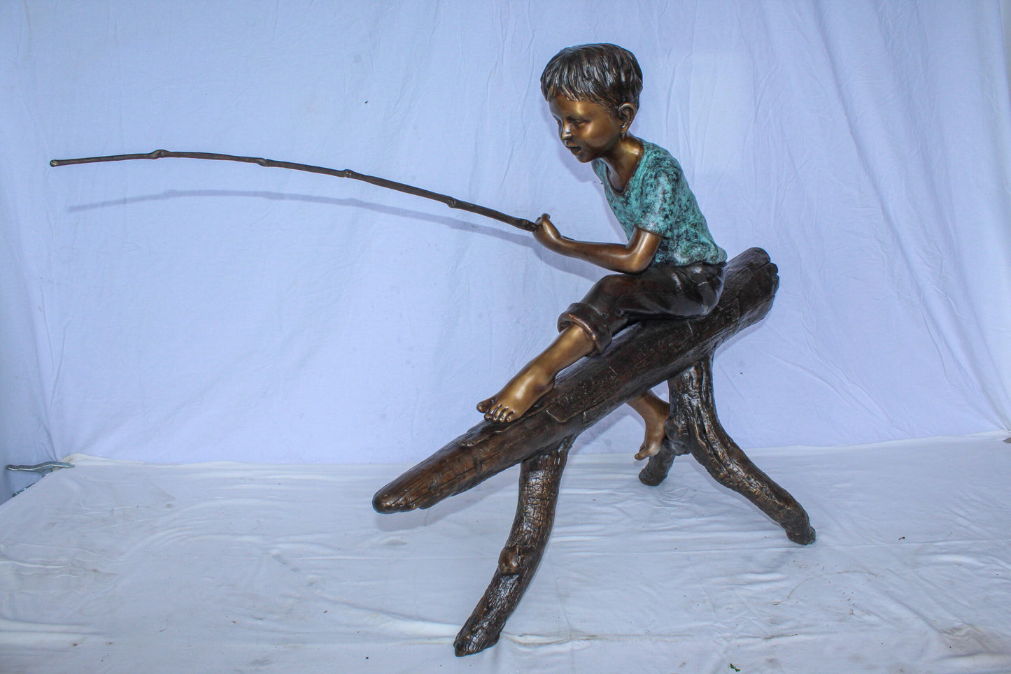 Bronze Statue of Boy Fishing Sitting on Tree Log 50" x 19" x 35"H