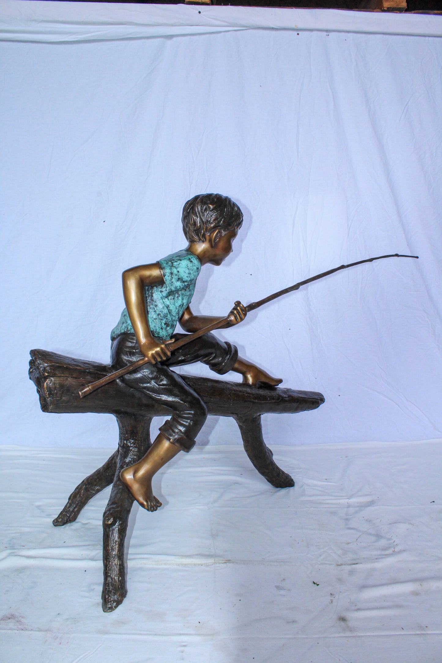 Bronze Statue of Boy Fishing Sitting on Tree Log 50" x 19" x 35"H