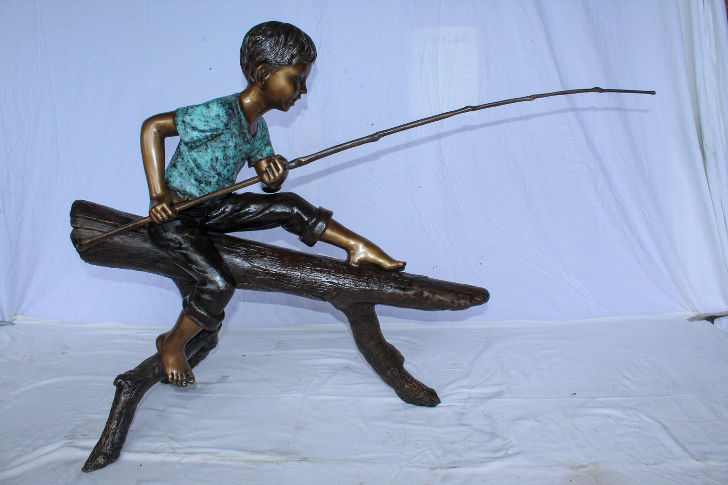 Bronze Statue of Boy Fishing Sitting on Tree Log 50" x 19" x 35"H