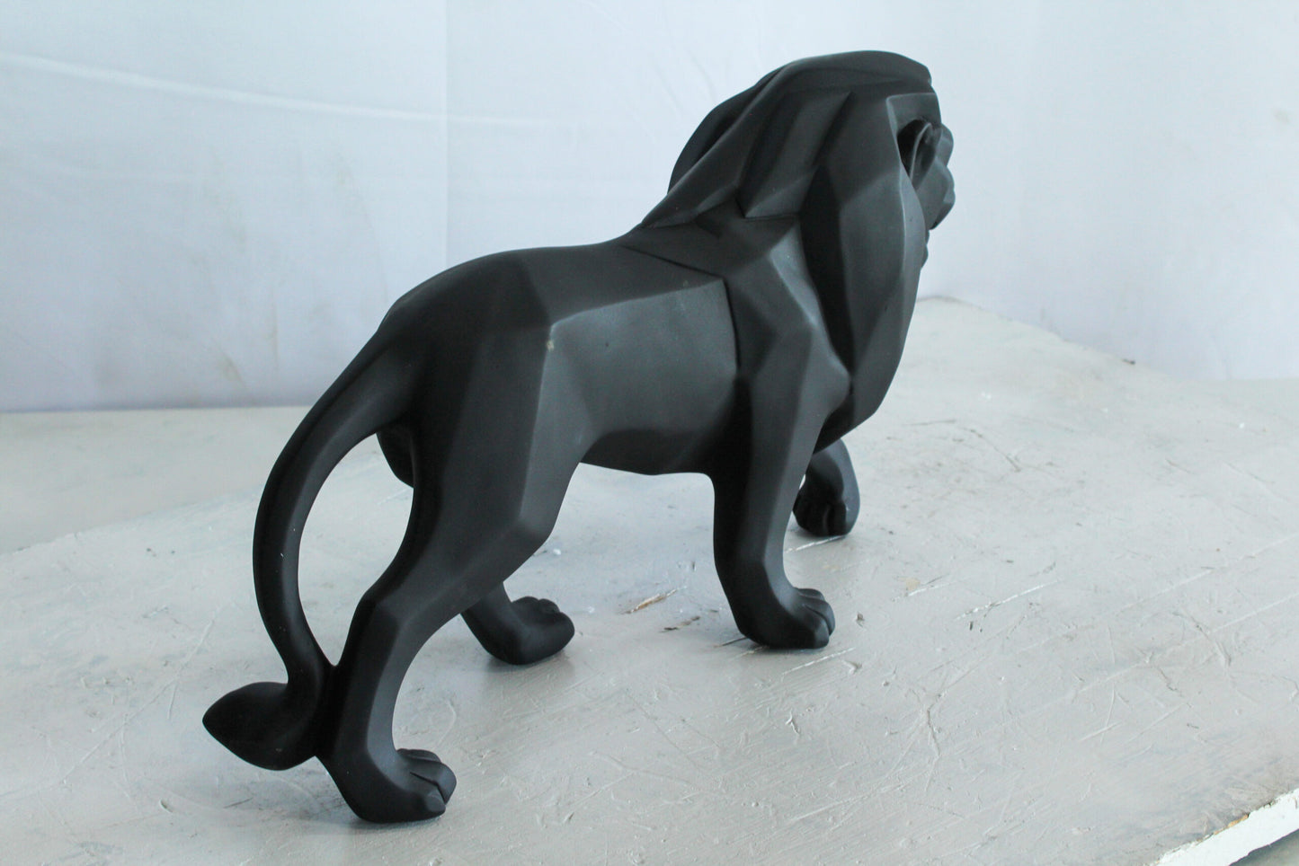 Black Resin Geometric Lion Sculpture in Modern Walking Pose 17" x 5" x 9"H