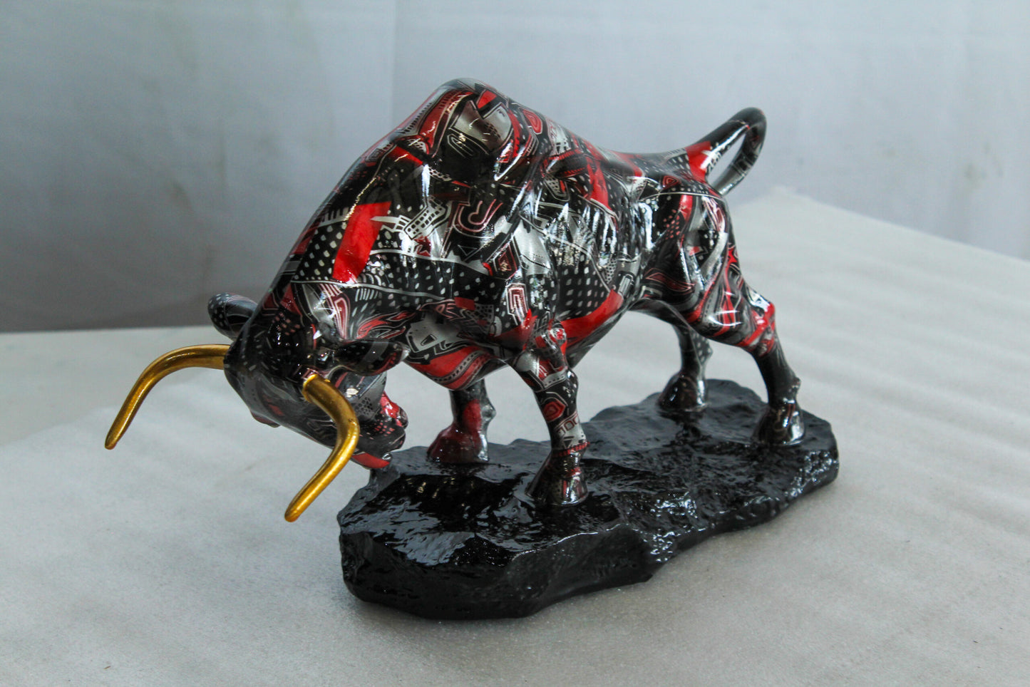 Nifao Resin Bull Statue –Abstract Street Art Indoor/Outdoor Sculpture, Red Black & Silver Patterned Charging Bull with Gold Horns on Glossy Black Base,Modern Decor &Collector’s Figurine 14" x 4" x 9"H