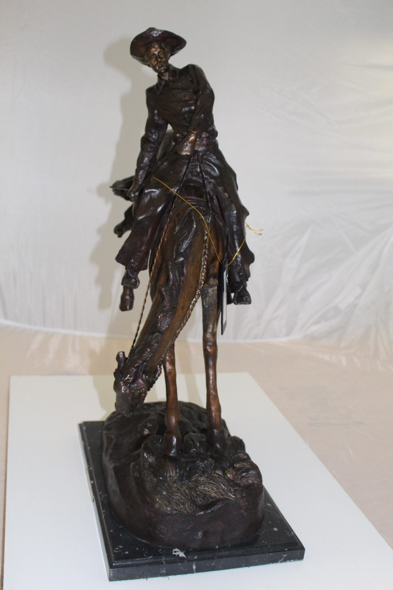 Outlaw Remington Bronze Statue - Size: 19"L x 10"W x 26"H.