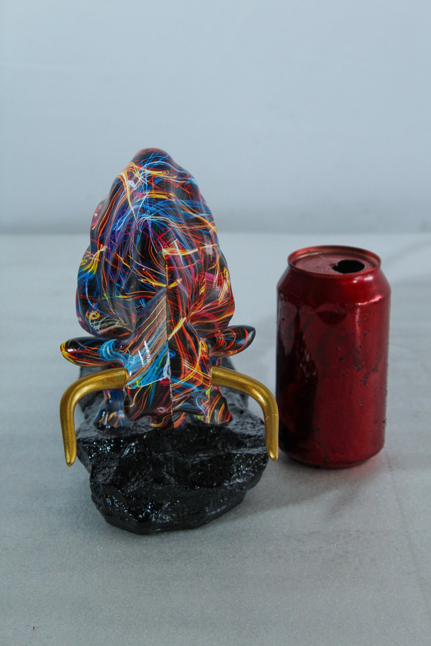 Nifao Resin Bull Statue - Multicolor Indoor/Outdoor Charging Bull SculptureRed,Blue,Yellow &Orange Design with Gold Horns on Glossy Black Base,Decorative Figurine for Homes,Offices14 x 4" x 9"H