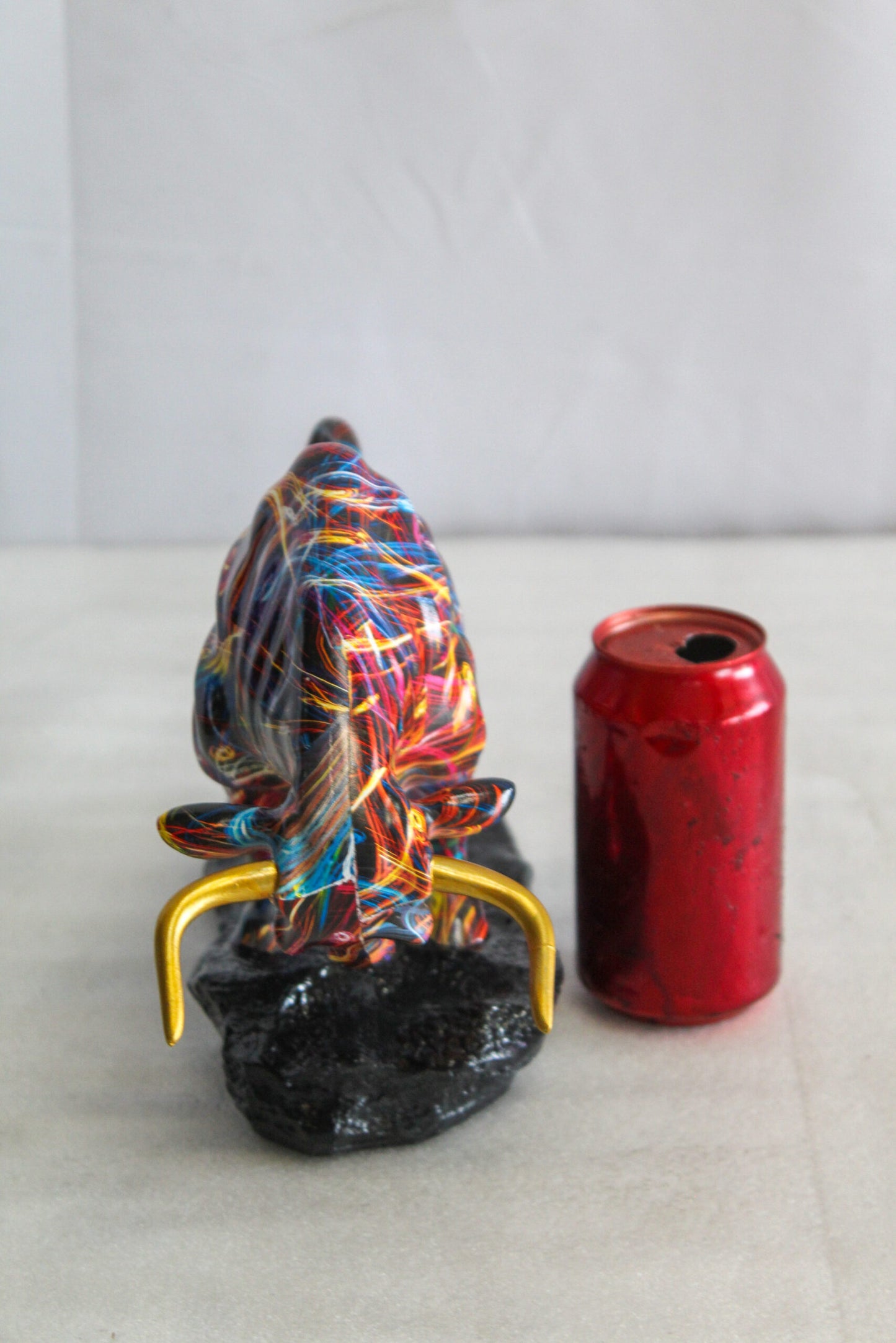 Nifao Resin Bull Statue - Multicolor Indoor/Outdoor Charging Bull SculptureRed,Blue,Yellow &Orange Design with Gold Horns on Glossy Black Base,Decorative Figurine for Homes,Offices14 x 4" x 9"H