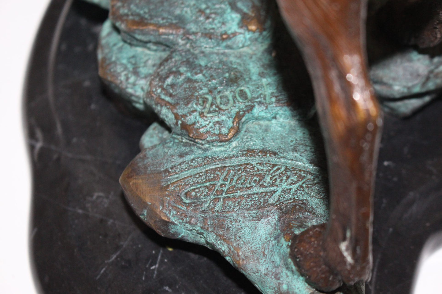 Two Rams on a rock Bronze Statue - Size: 15"L x 8"W x 16"H.