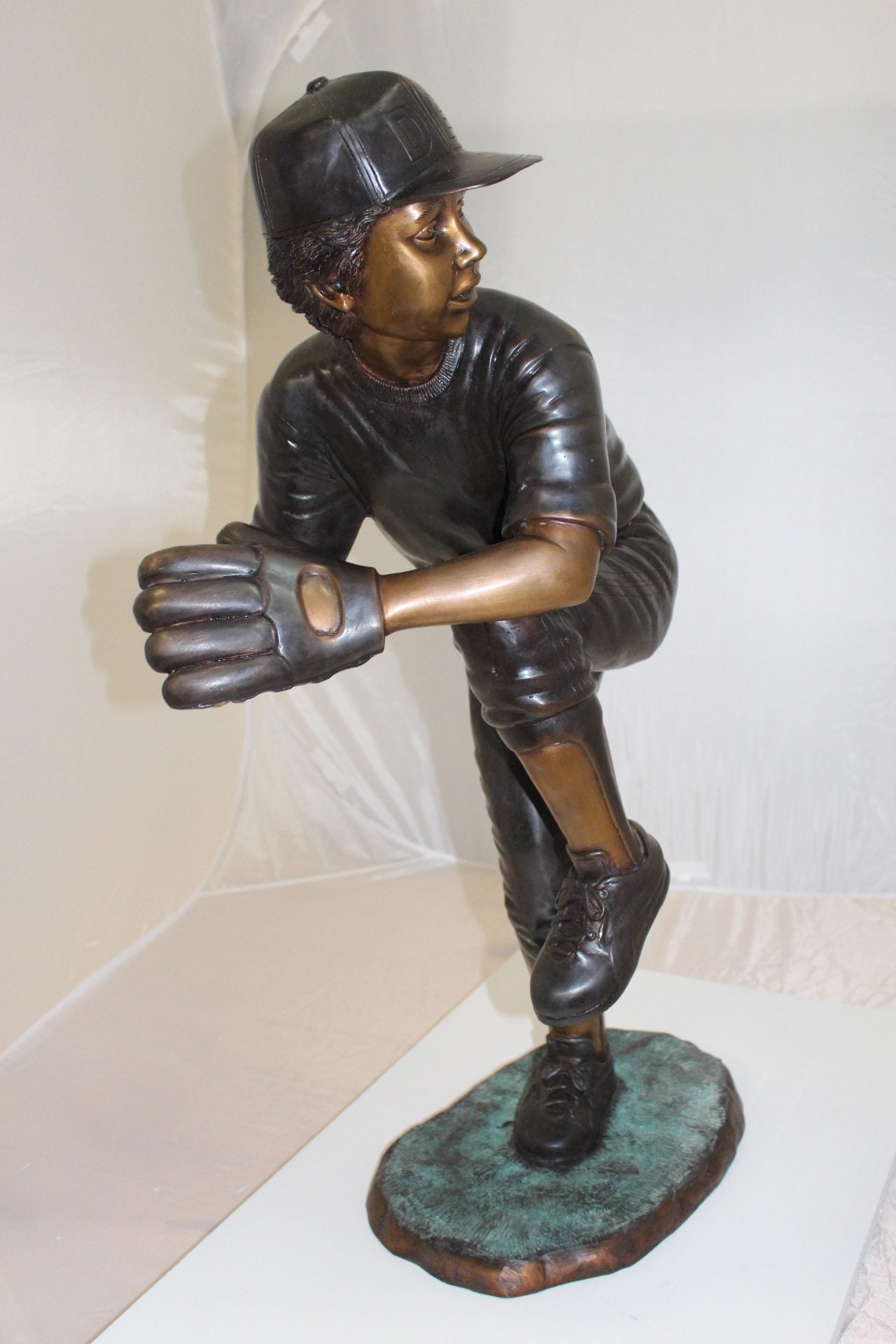 Boy plays baseball Bronze Statue - Size: 22"L x 12"W x 36"H.