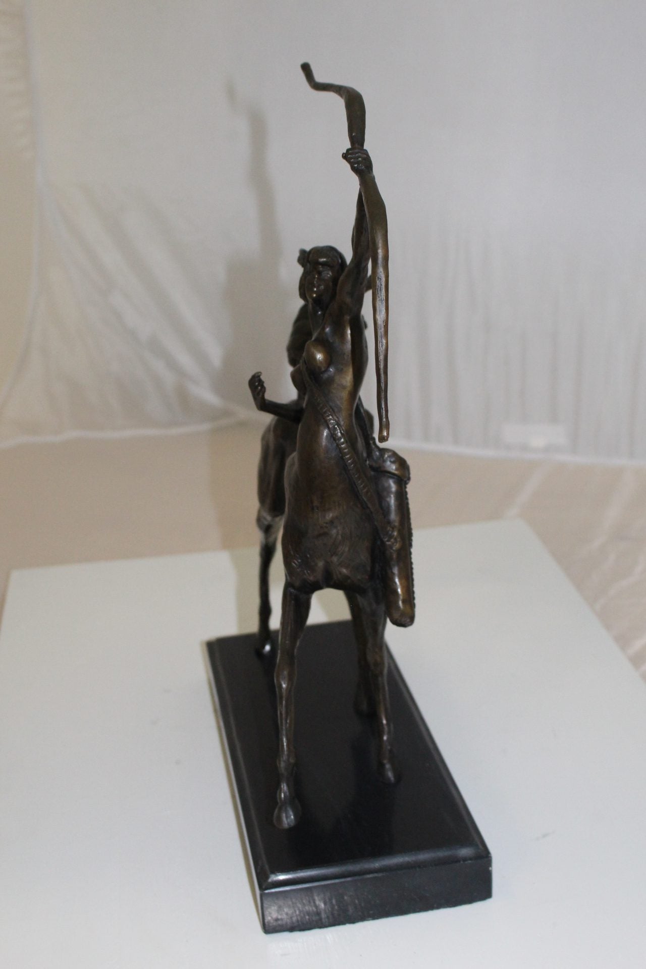 horse woman shooting an arrow Bronze Statue - Size: 14"L x 6"W x 20"H.