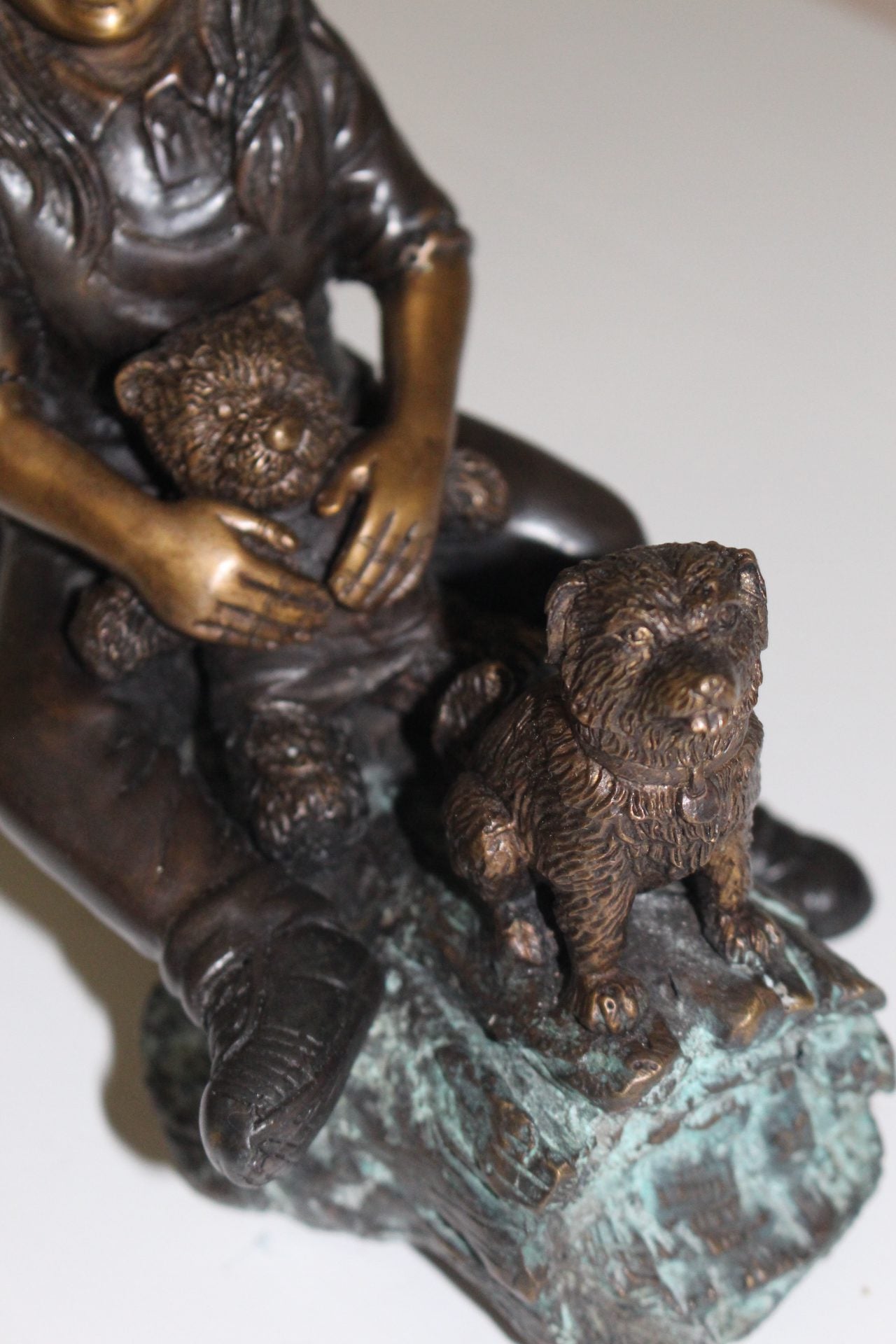 Two kids with dog on log Bronze Statue - Size: 12"L x 5"W x 8.5"H.