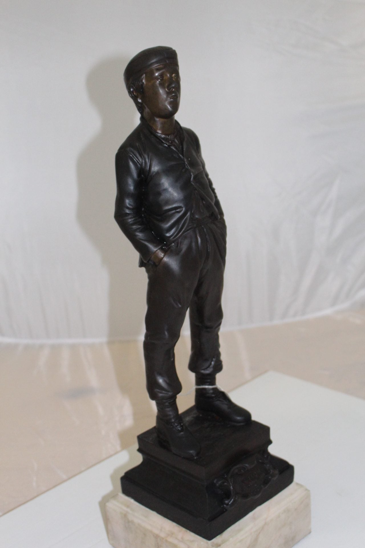 Boy standing Bronze Statue -  Size: 7.5"L x 7.5"W x 23.5"H.