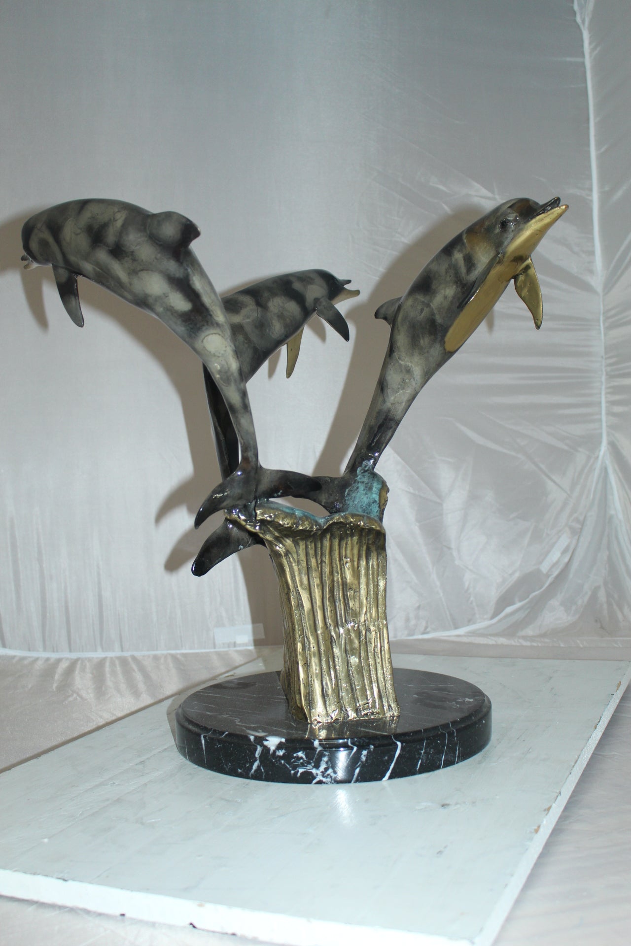 Three Dolphins Table Base Bronze Statue - Size: 20"L x 20"W x 21"H.