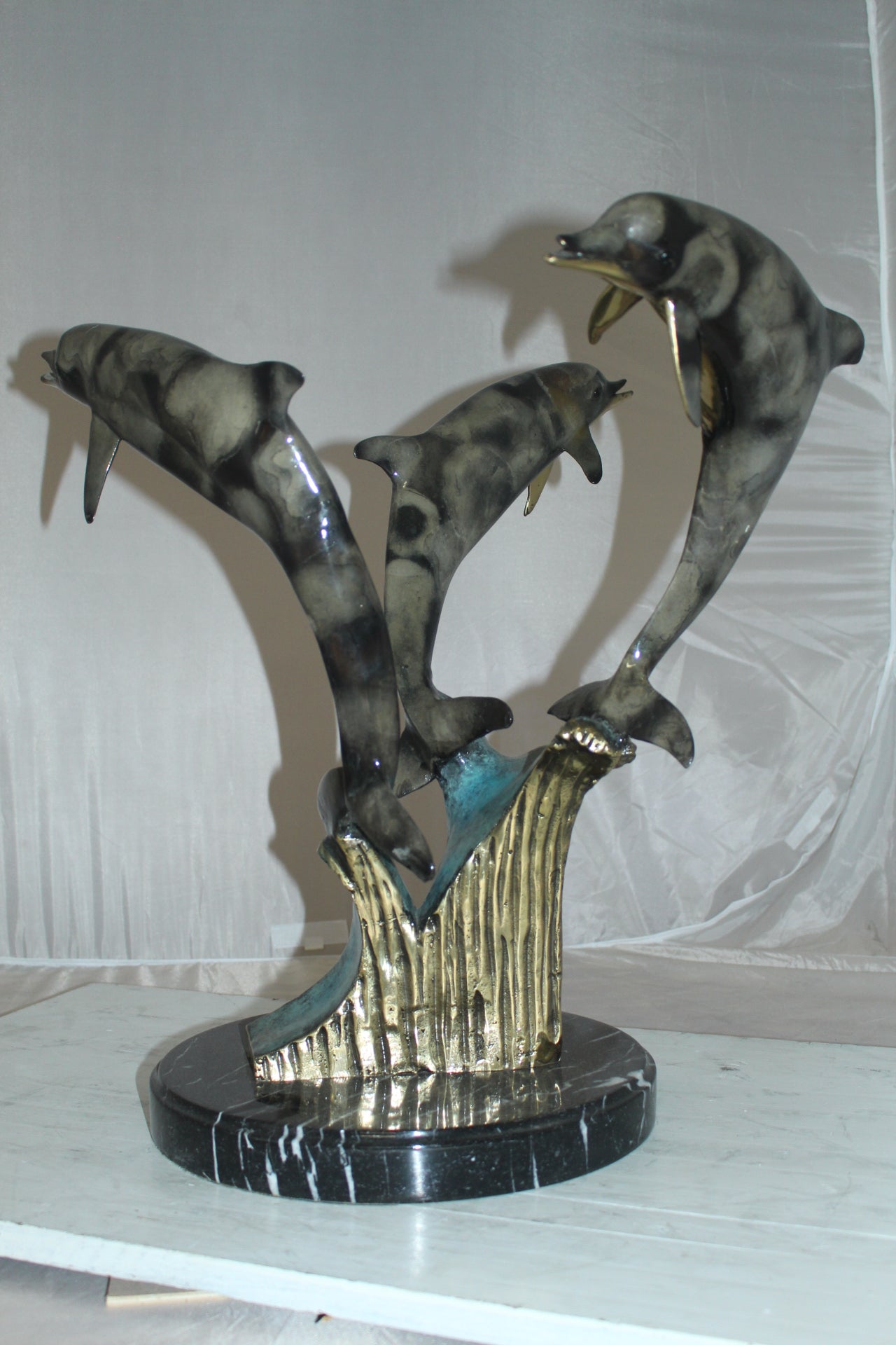 Three Dolphins Table Base Bronze Statue - Size: 20"L x 20"W x 21"H.