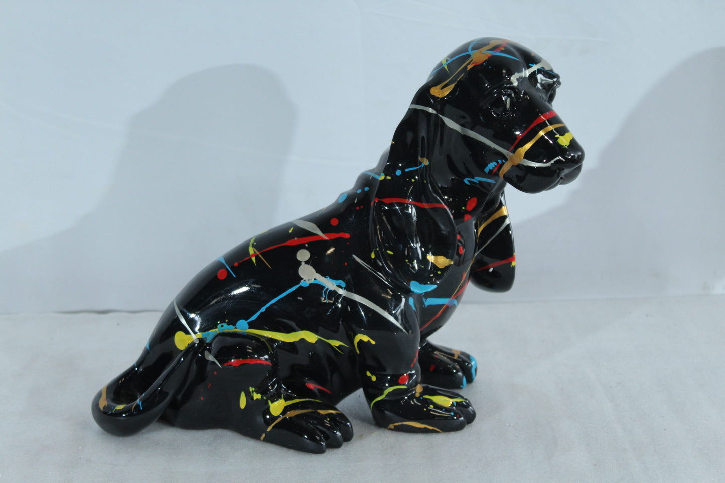 Nifao Resin Basset Hound Statue –Colorful Indoor/Outdoor Dog Sculpture with Abstract Pain Design on Glossy Black Finish,Modern Decorative Figurine for Dog Lovers,Art Collections16 x 8" x 13"H