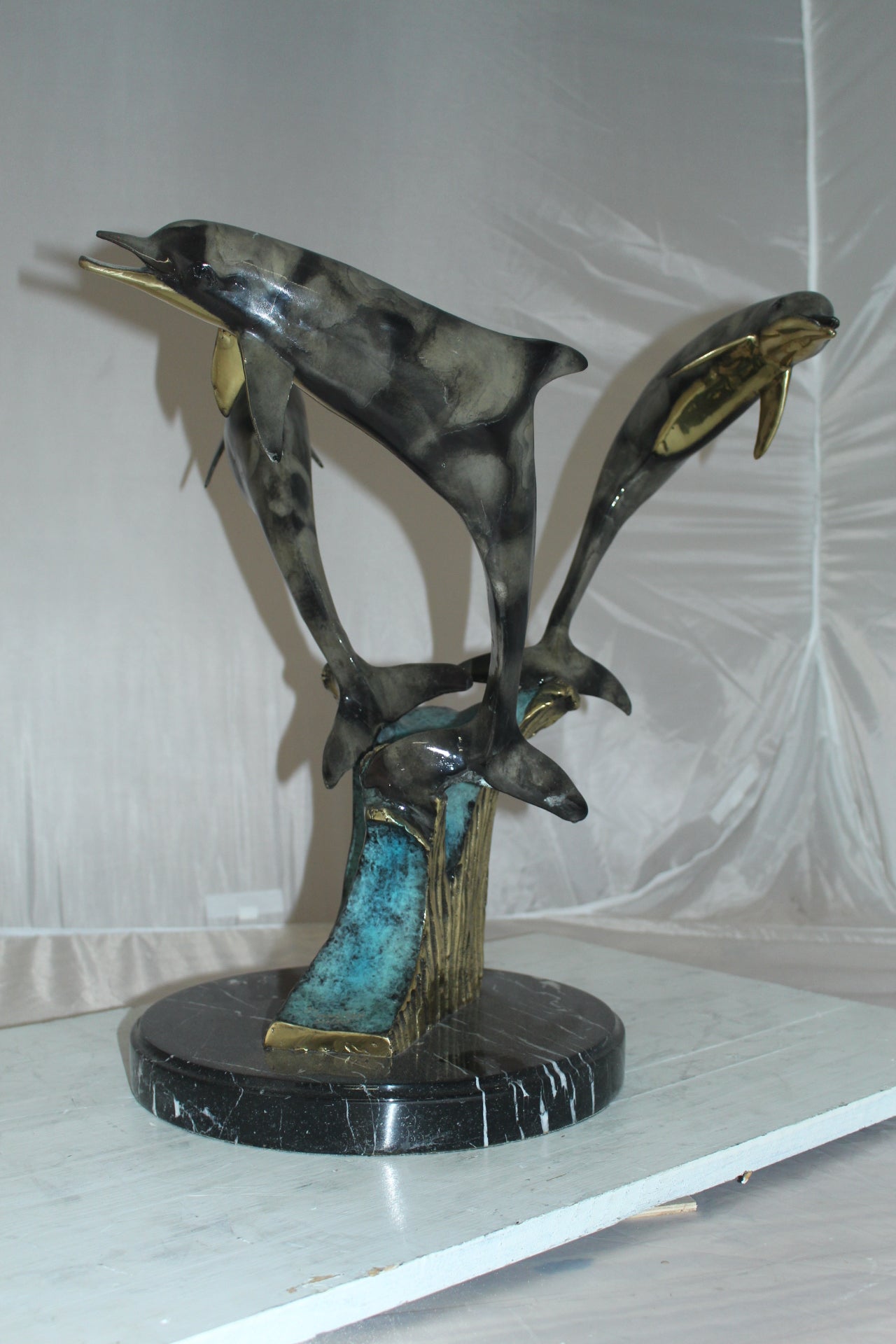 Three Dolphins Table Base Bronze Statue - Size: 20"L x 20"W x 21"H.