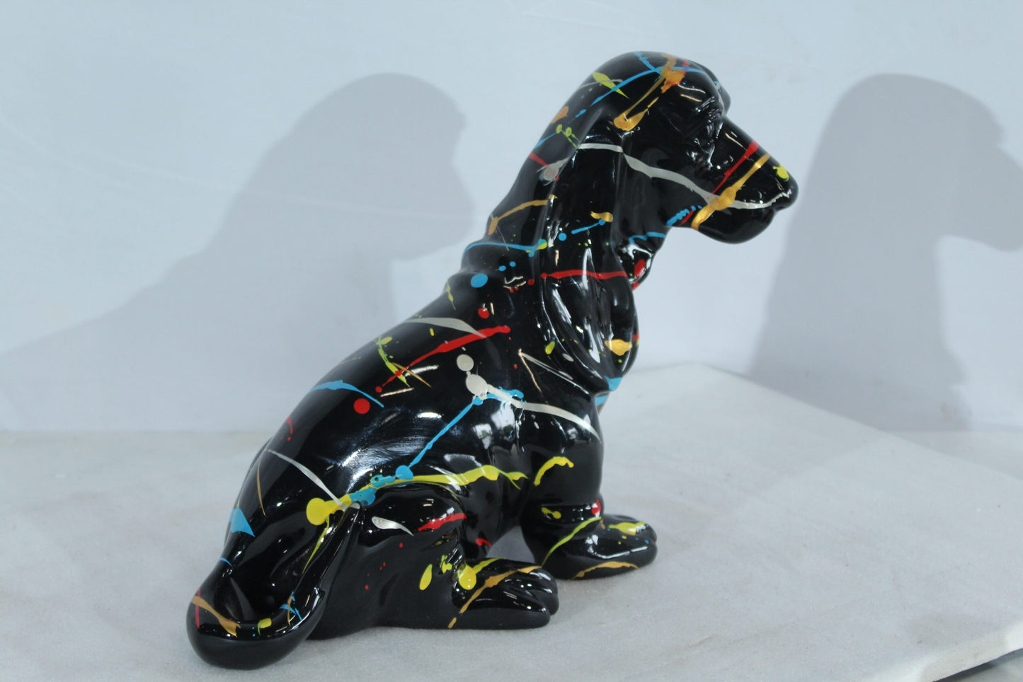 Nifao Resin Basset Hound Statue –Colorful Indoor/Outdoor Dog Sculpture with Abstract Pain Design on Glossy Black Finish,Modern Decorative Figurine for Dog Lovers,Art Collections16 x 8" x 13"H