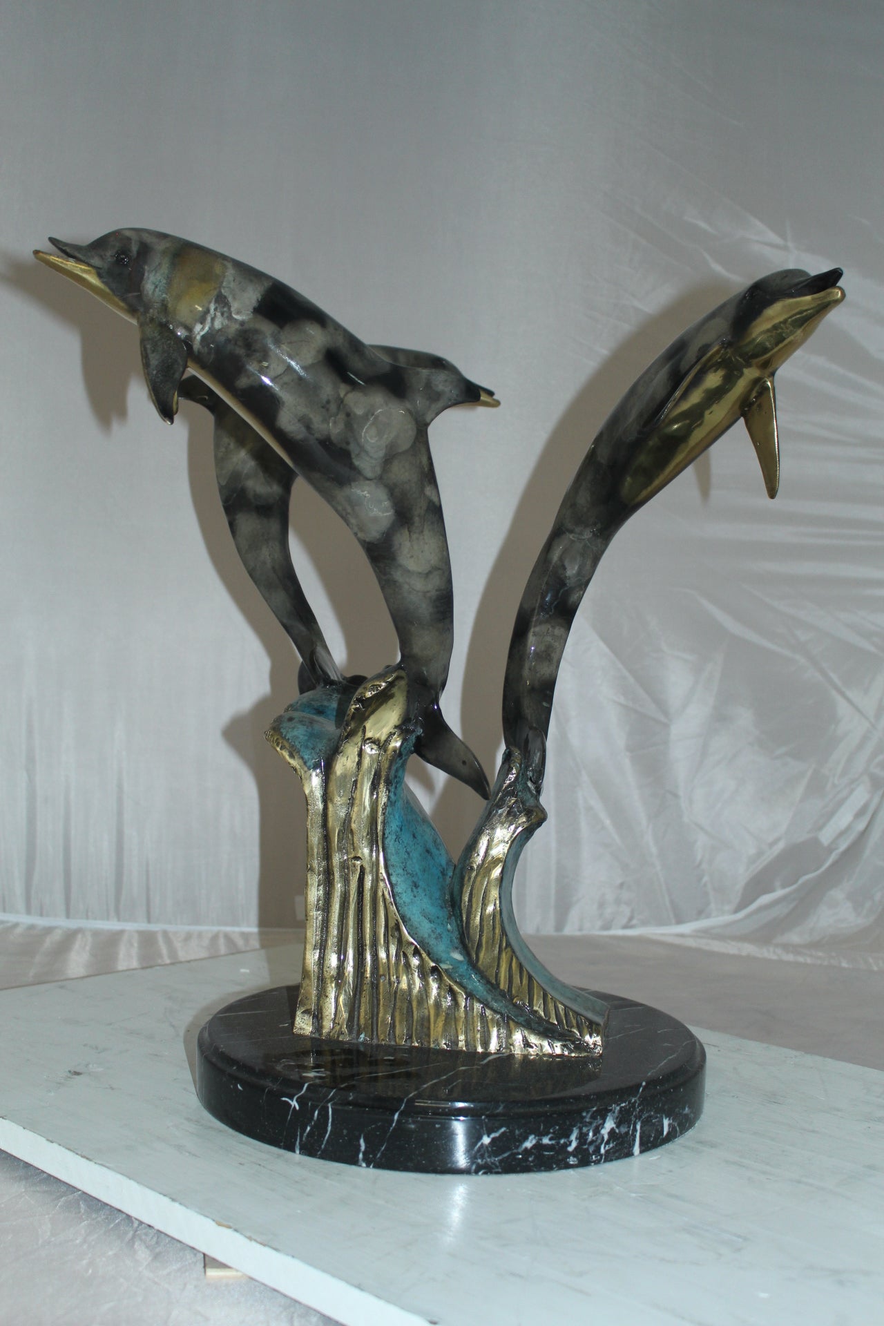 Three Dolphins Table Base Bronze Statue - Size: 20"L x 20"W x 21"H.