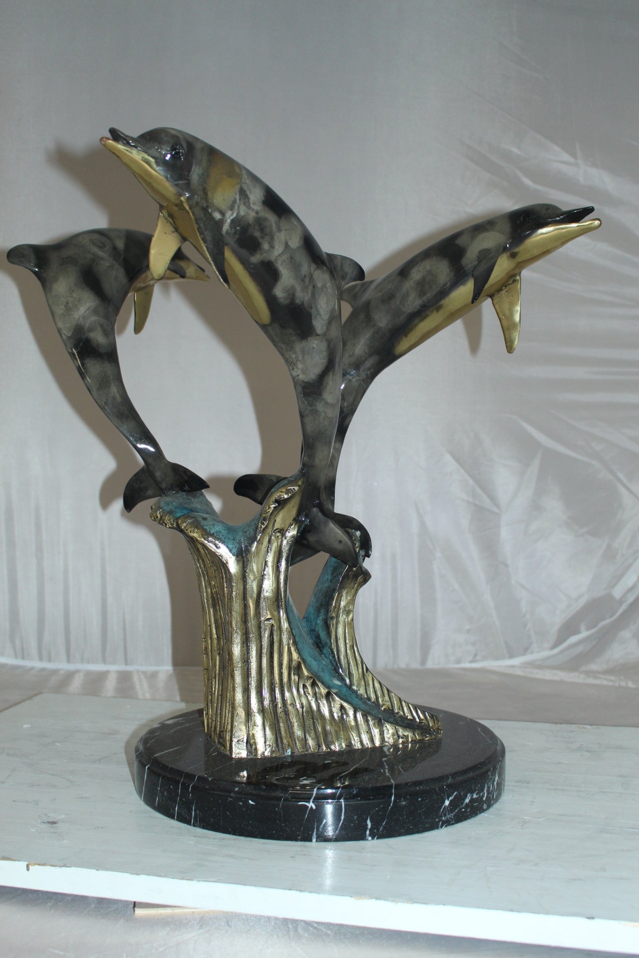 Three Dolphins Table Base Bronze Statue - Size: 20"L x 20"W x 21"H.