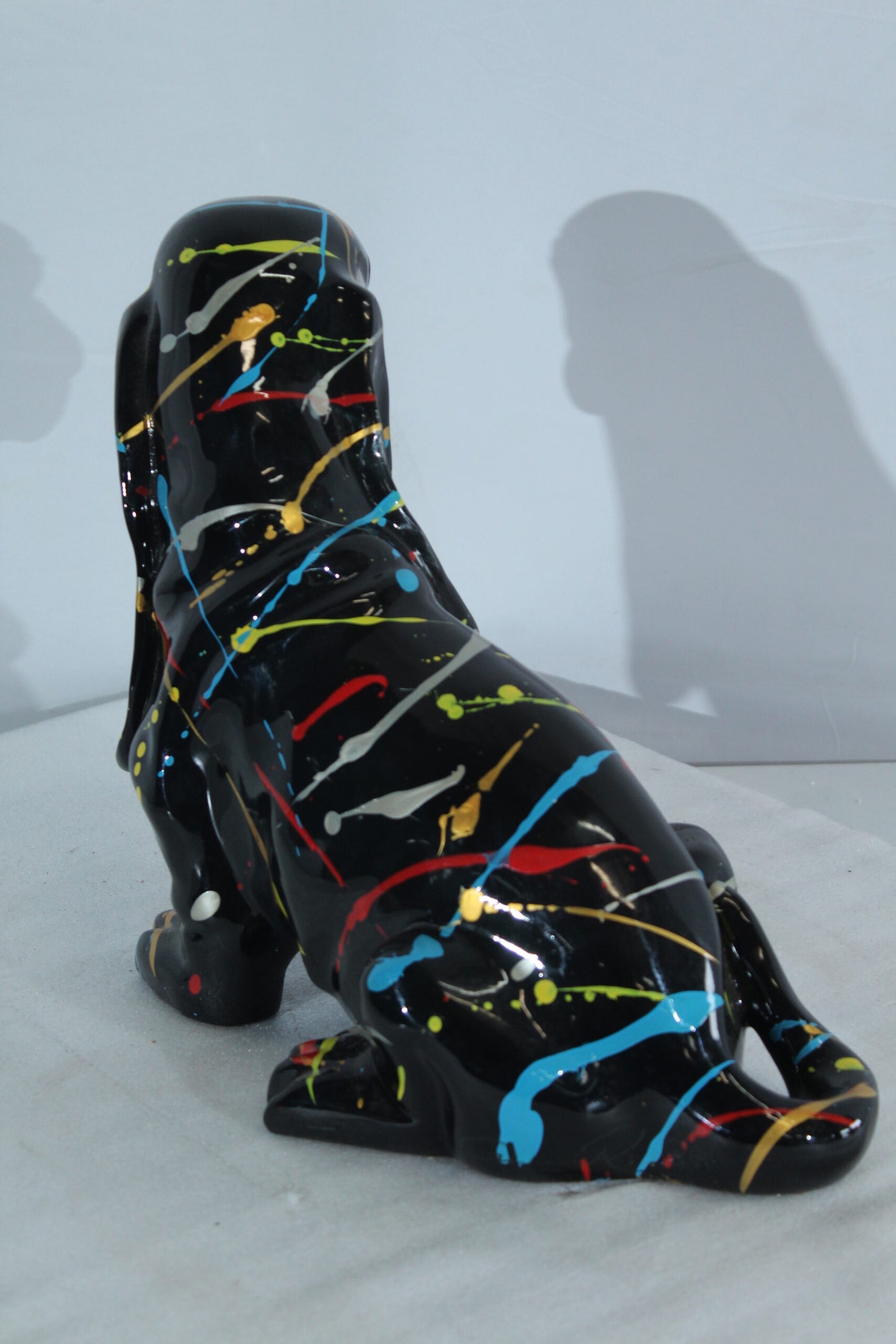 Nifao Resin Basset Hound Statue –Colorful Indoor/Outdoor Dog Sculpture with Abstract Pain Design on Glossy Black Finish,Modern Decorative Figurine for Dog Lovers,Art Collections16 x 8" x 13"H