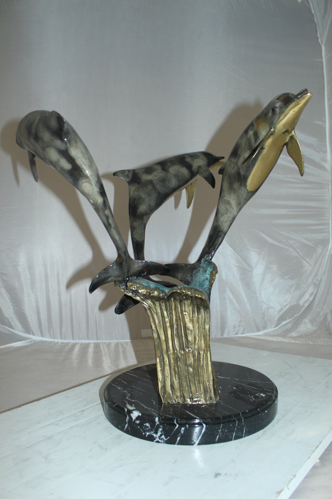 Three Dolphins Table Base Bronze Statue - Size: 20"L x 20"W x 21"H.