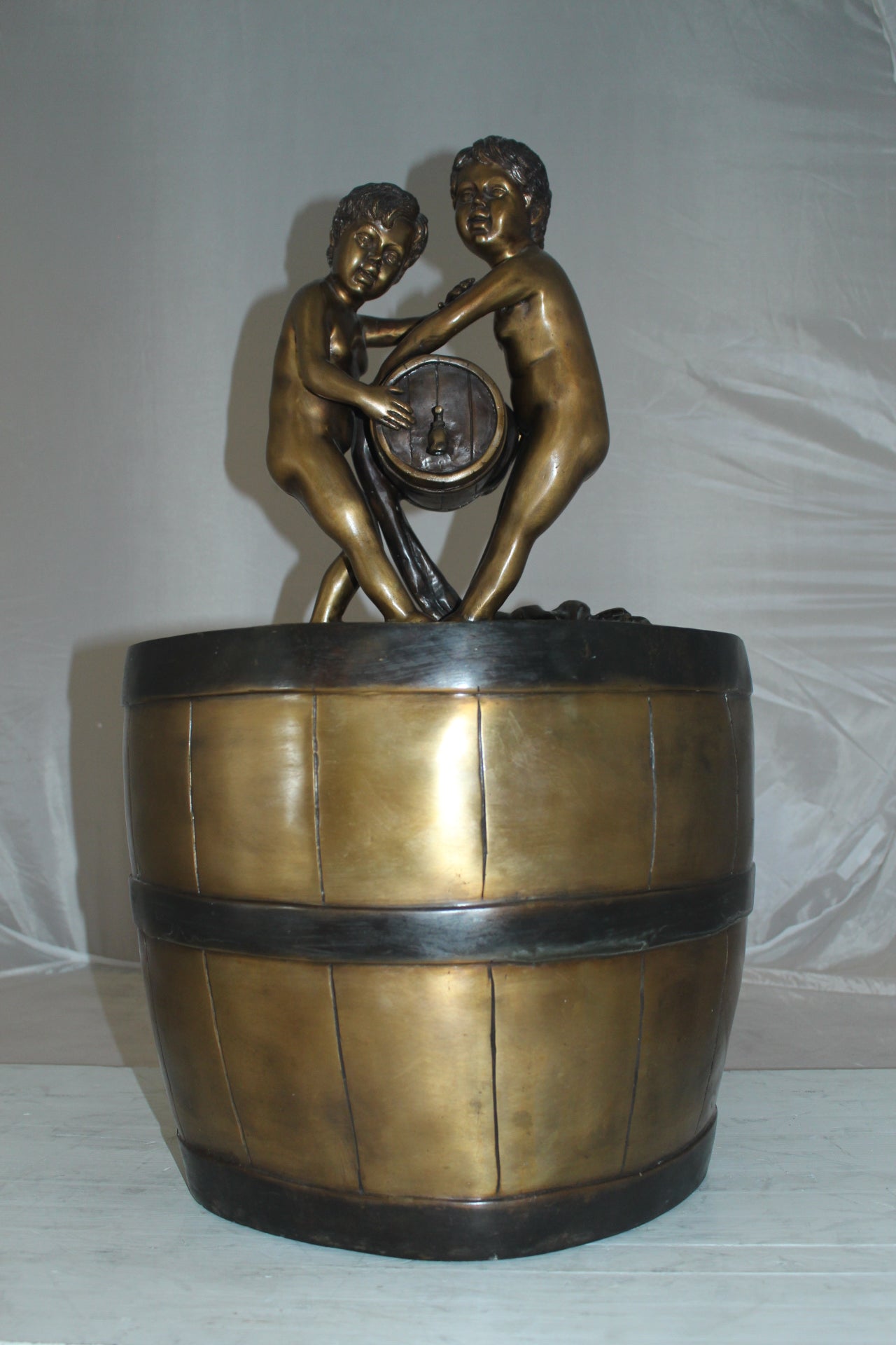 Two boys on a bucket self-contained fountain bronze statue - 16" x 16" x 29"H.