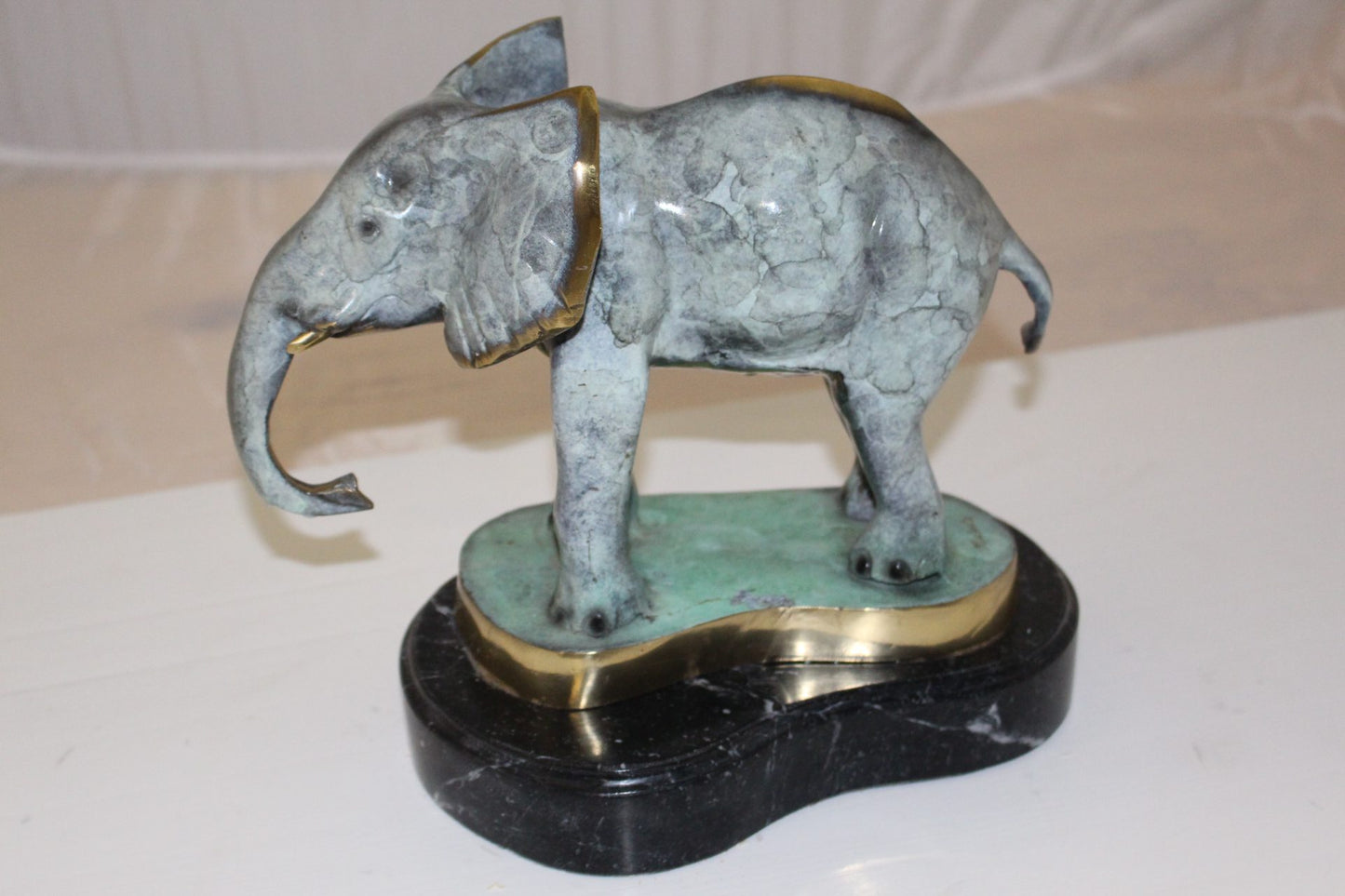 Elephant Bronze Statue - Size: 11"L x 8"W x 10"H.