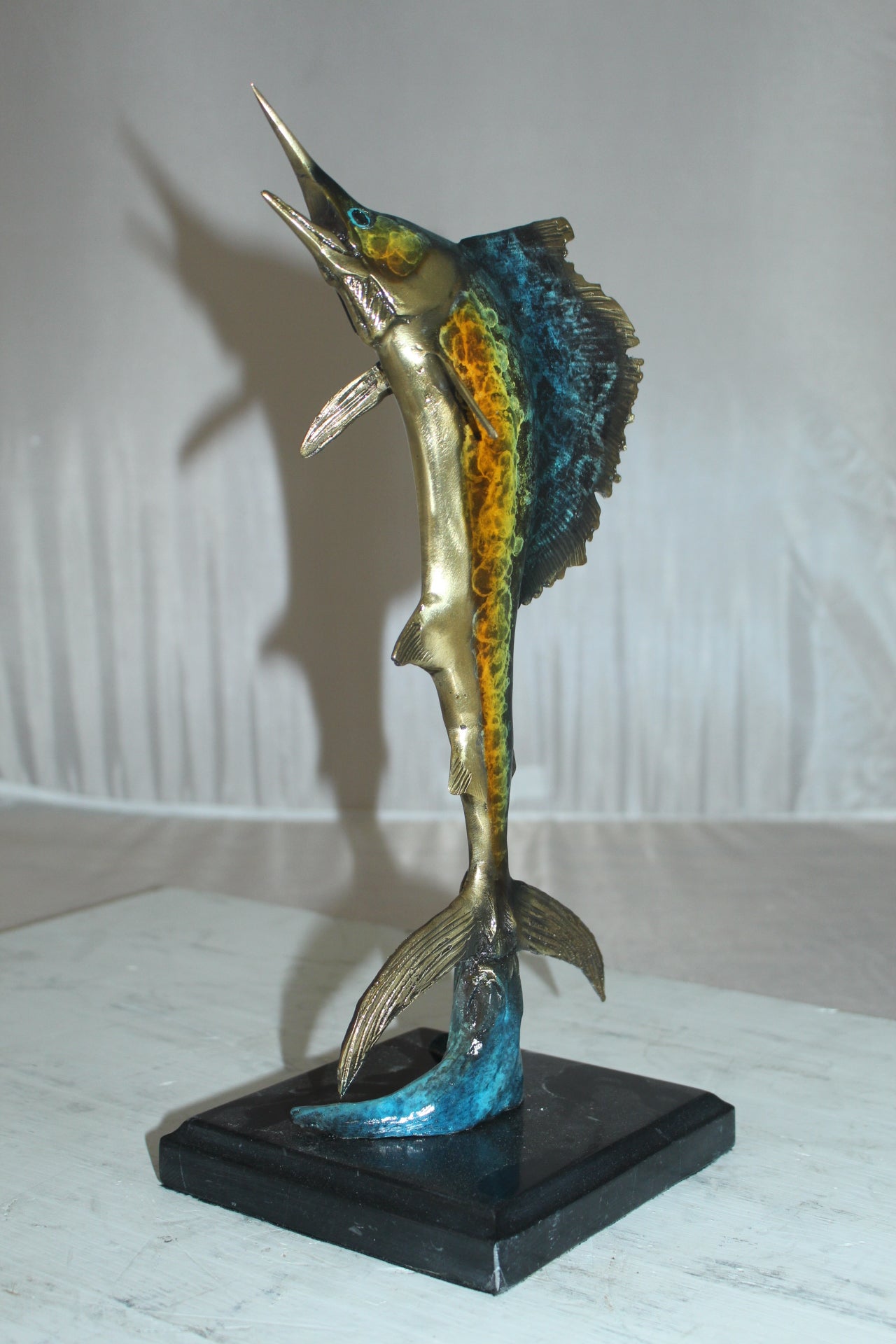 Single Sailfish Bronze Statue - Size: 6"L x 6"W x 15"H.