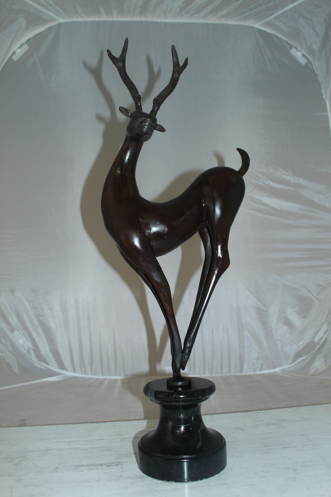 Deer standing Bronze Statue - Size: 12"L x 7"W x 30"H.